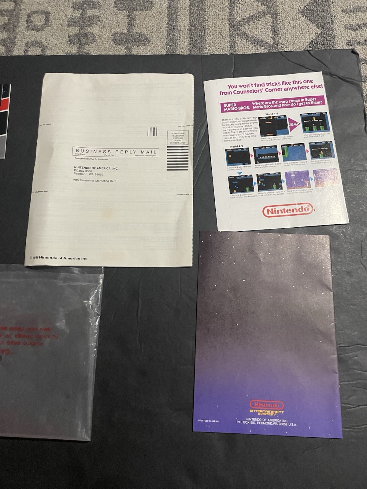 Nintendo NES Original paperwork Warranty Poster Plastic Bag Mario Manual Etc