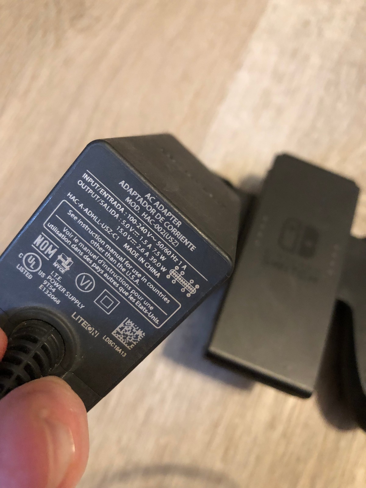 Nintendo Switch AC Adapter Model HAC-002(USZ). Tested with bonus grip HAC-011