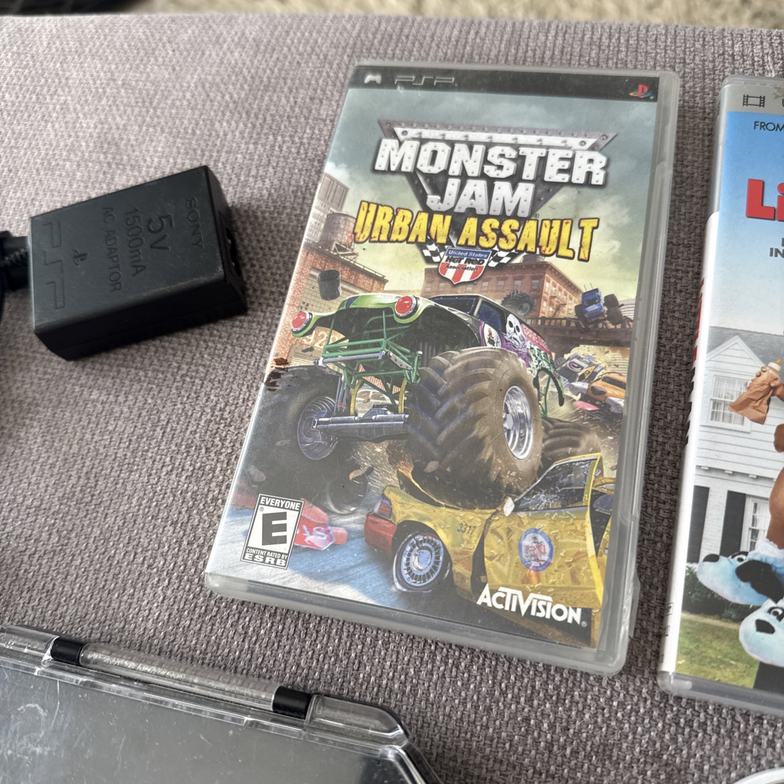 Sony PSP-1001 Black Console With Charger, 1GB Card , 11 Movies 2 Games & Case