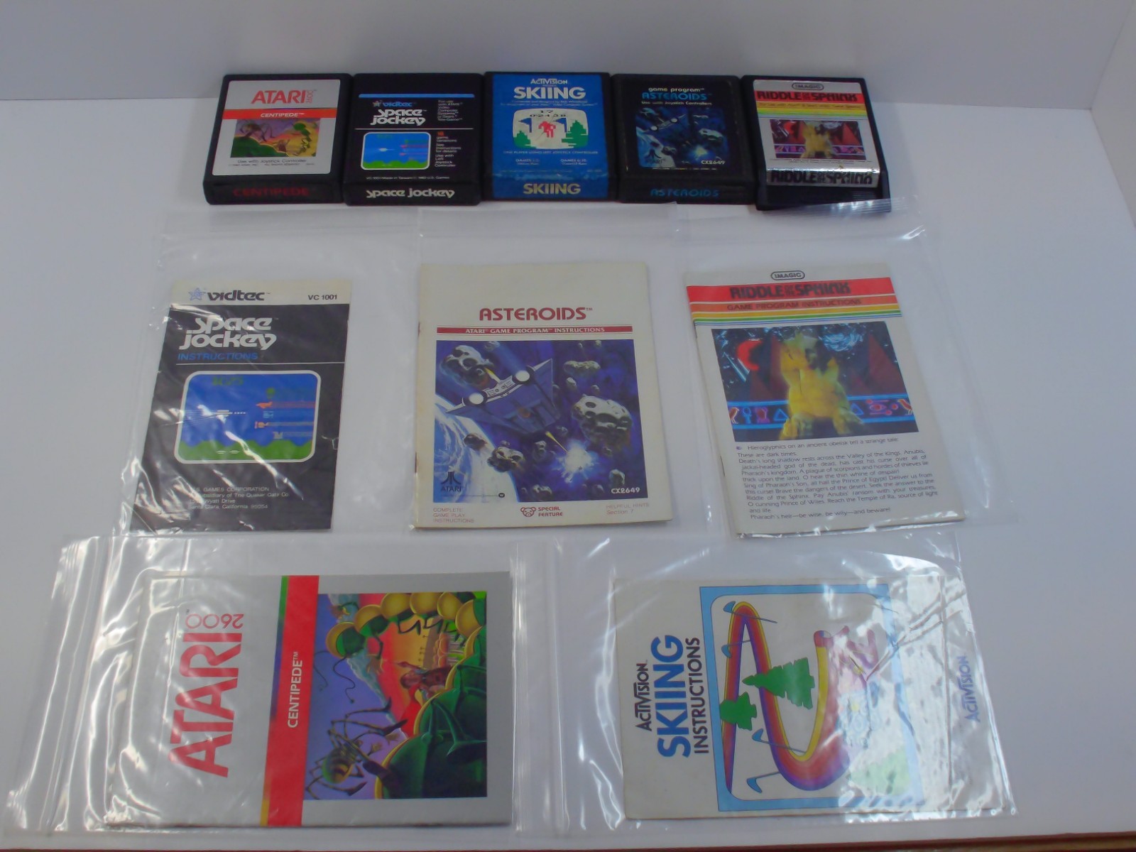 Atari 2600 Lot of 10 Games w Manuals Centripede River Raid Asteroids TESTED RP