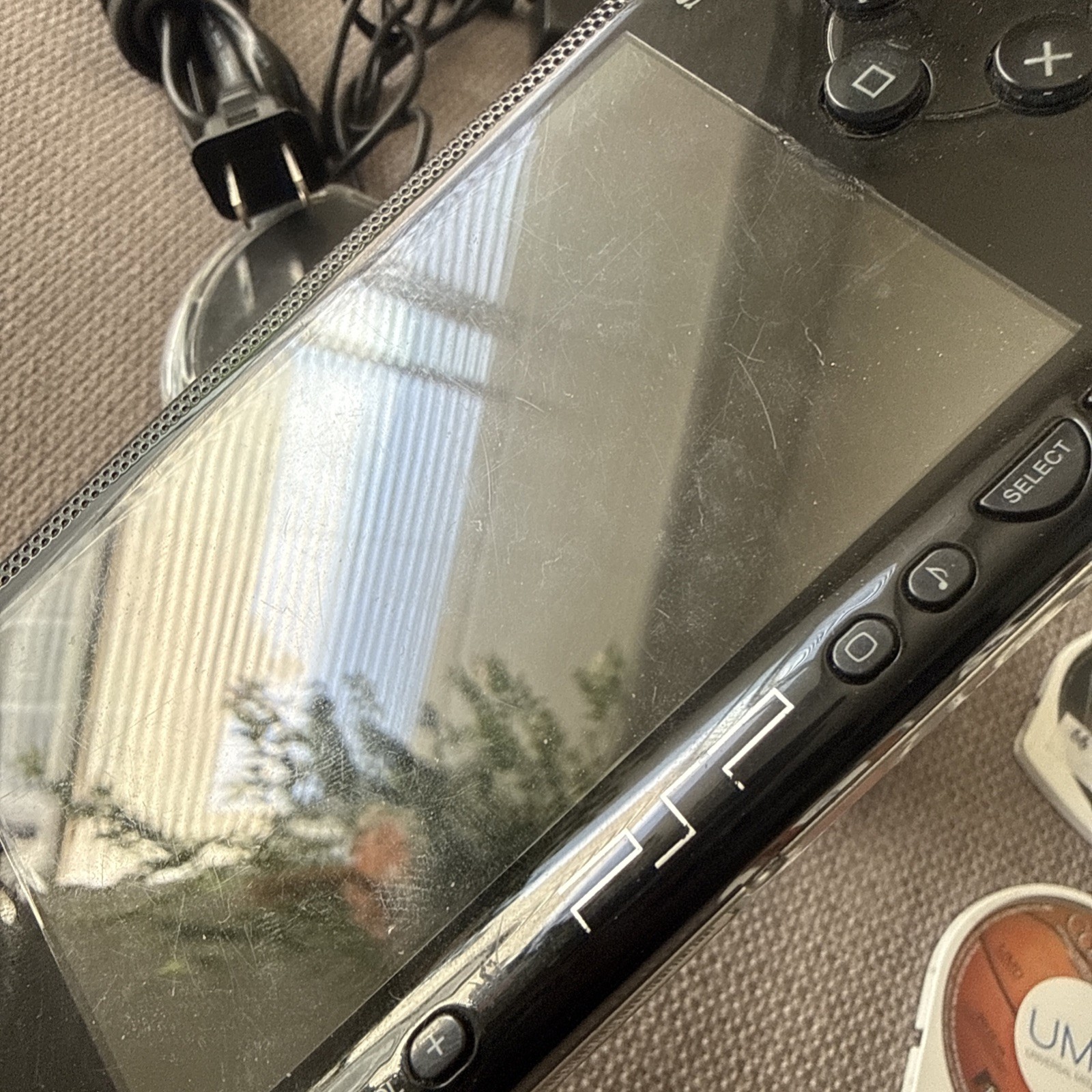 Sony PSP-1001 Black Console With Charger, 1GB Card , 11 Movies 2 Games & Case