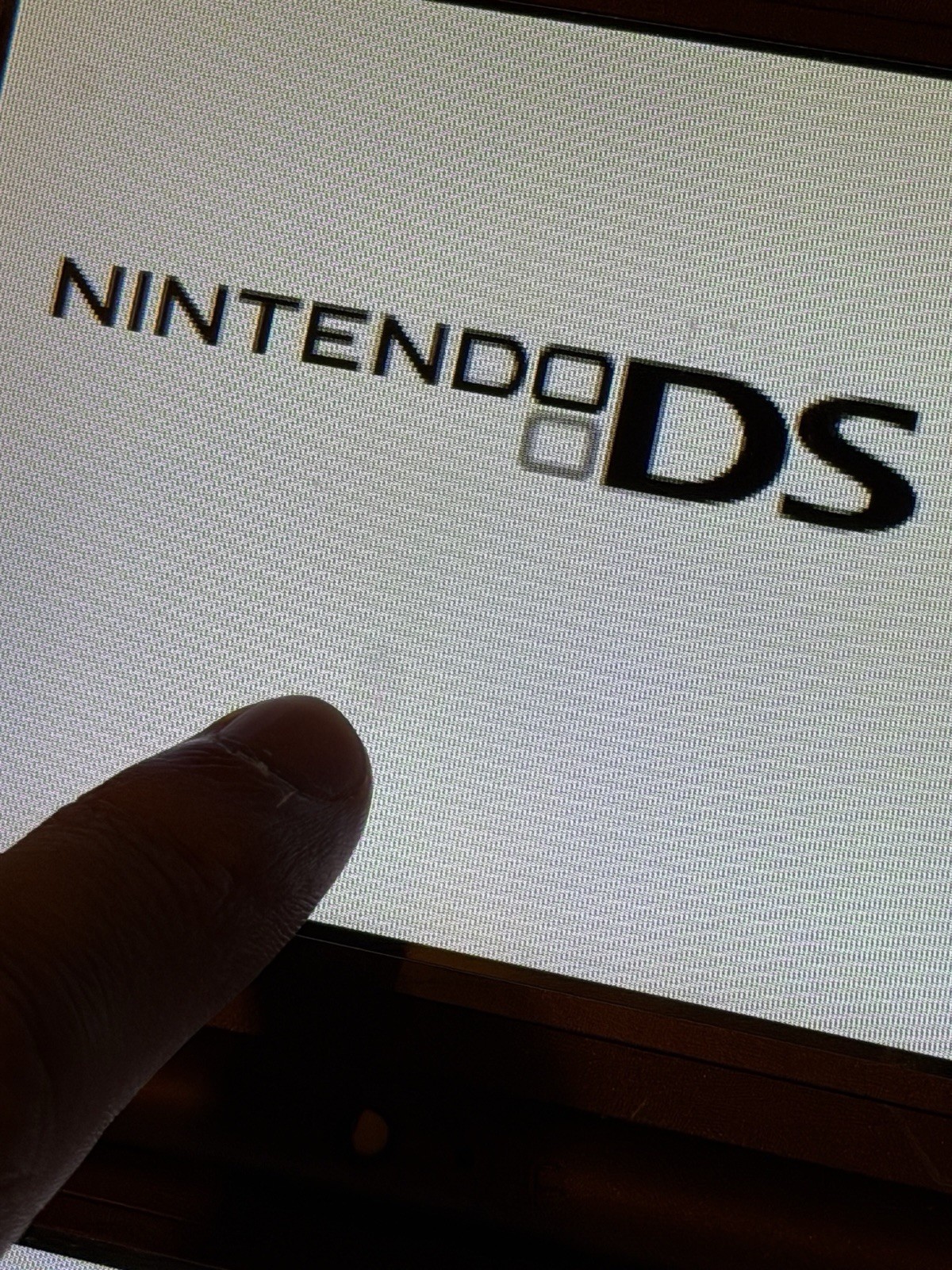 Nintendo DSi XL Handheld System – Burgundy Clean