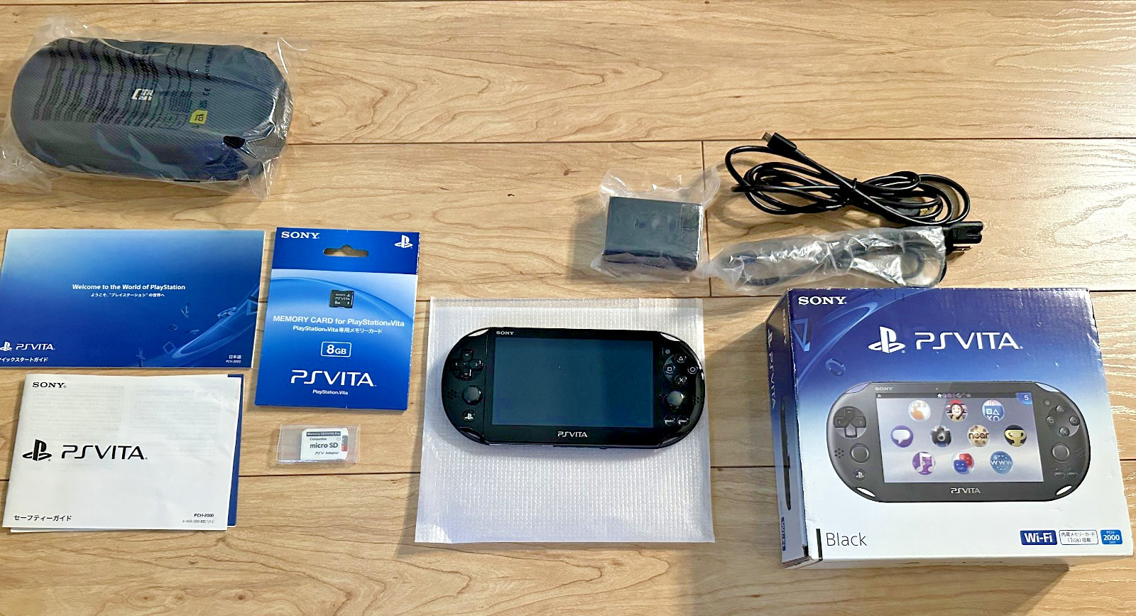 Sony PS Vita PCH-2000 1GB Black JP – Excellent. Orig Box + 8GB MC + 128GB mSD