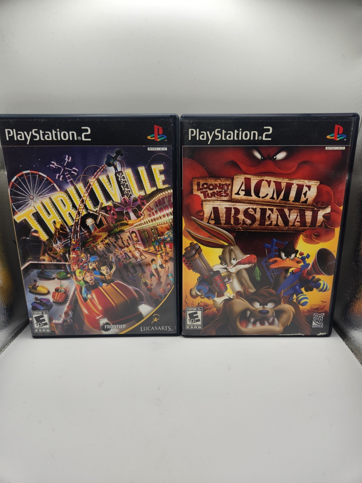 Looney Tunes: Acme Arsenal & Thrillville: Sony PlayStation 2 – Cib Great Shape
