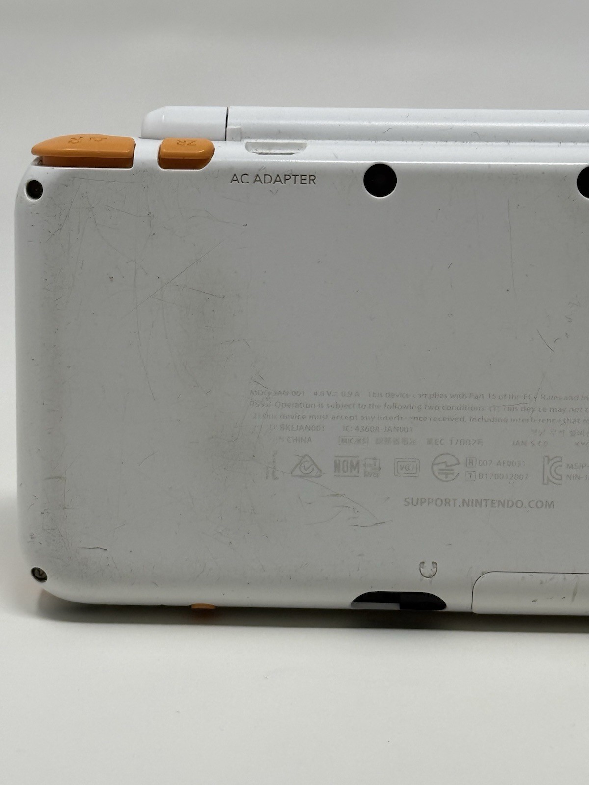 New Nintendo 2DS XL Orange White Handheld USA System w Charger Stylus and Extras
