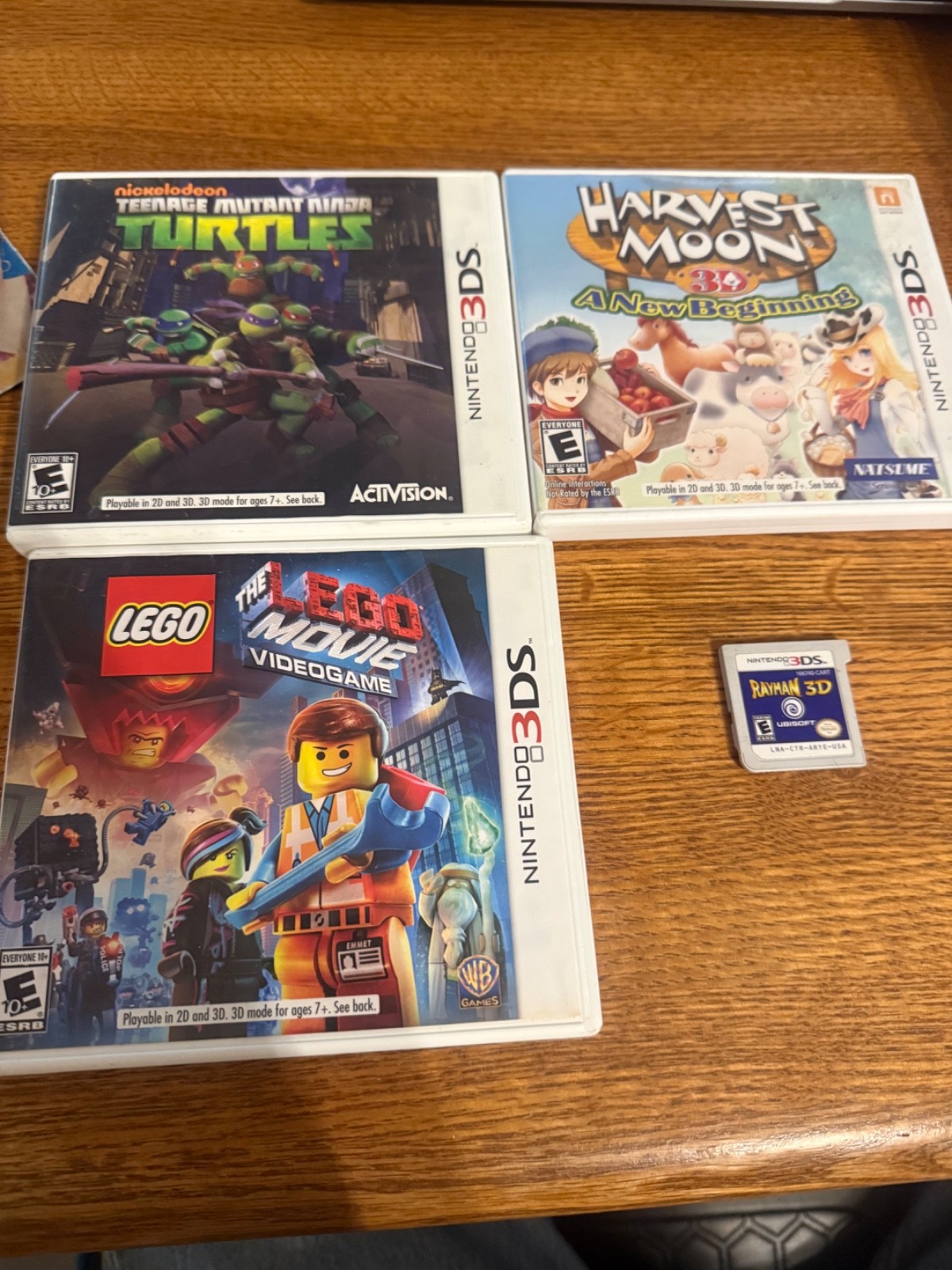 Nintendo 3DS Games lot – harvest moon, tmnt, Lego movie and Rayman 3d
