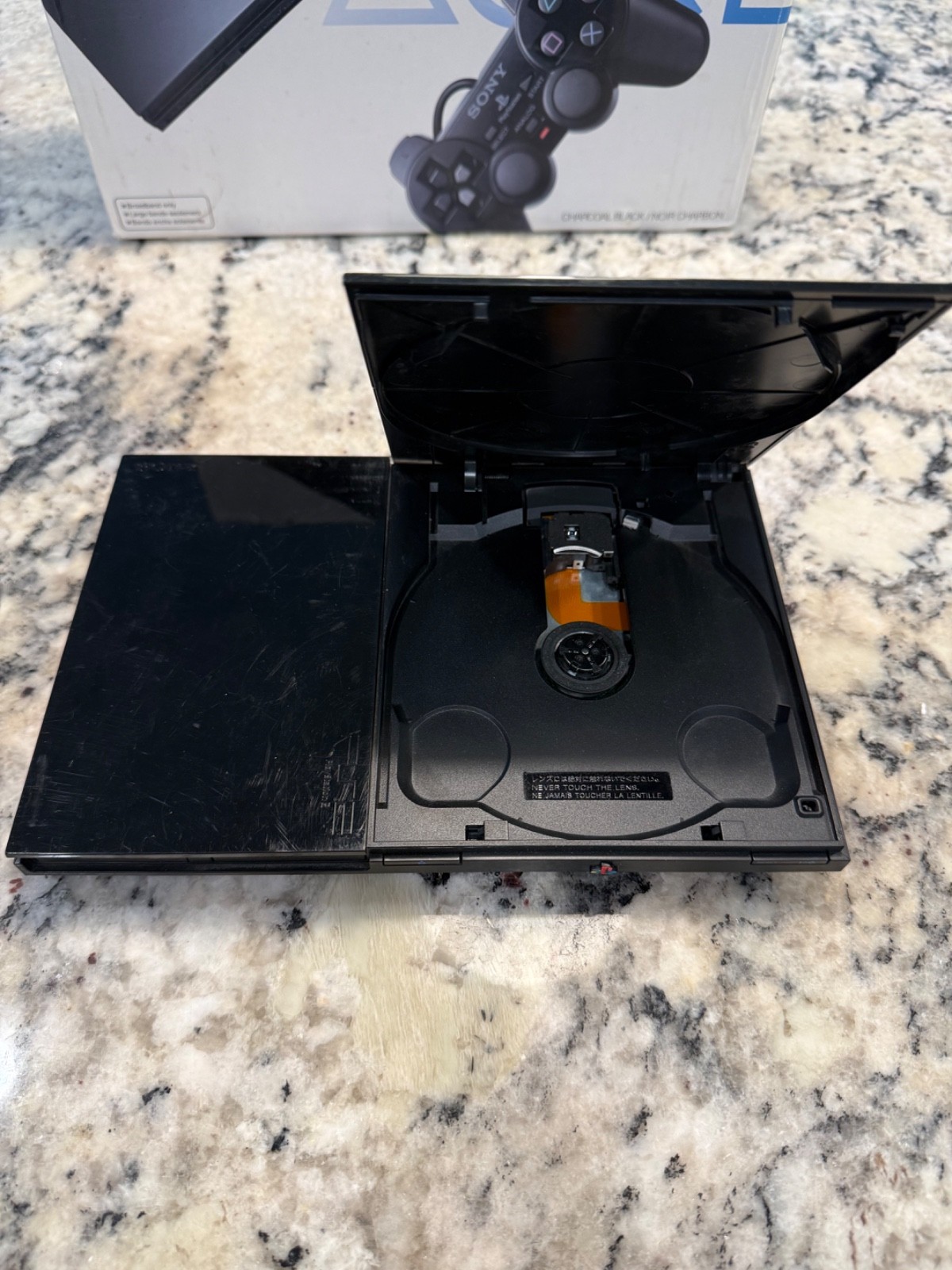 Playstation PS2 Slim SCPH-90001 with box and matching serial number.