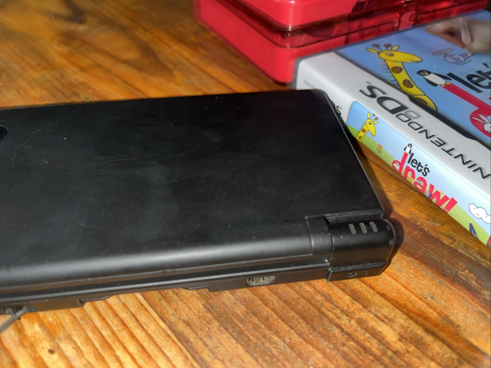 Nintendo DSi (TWL-001) 2008 Black Bundle w/ 5 Games & Carrying Case