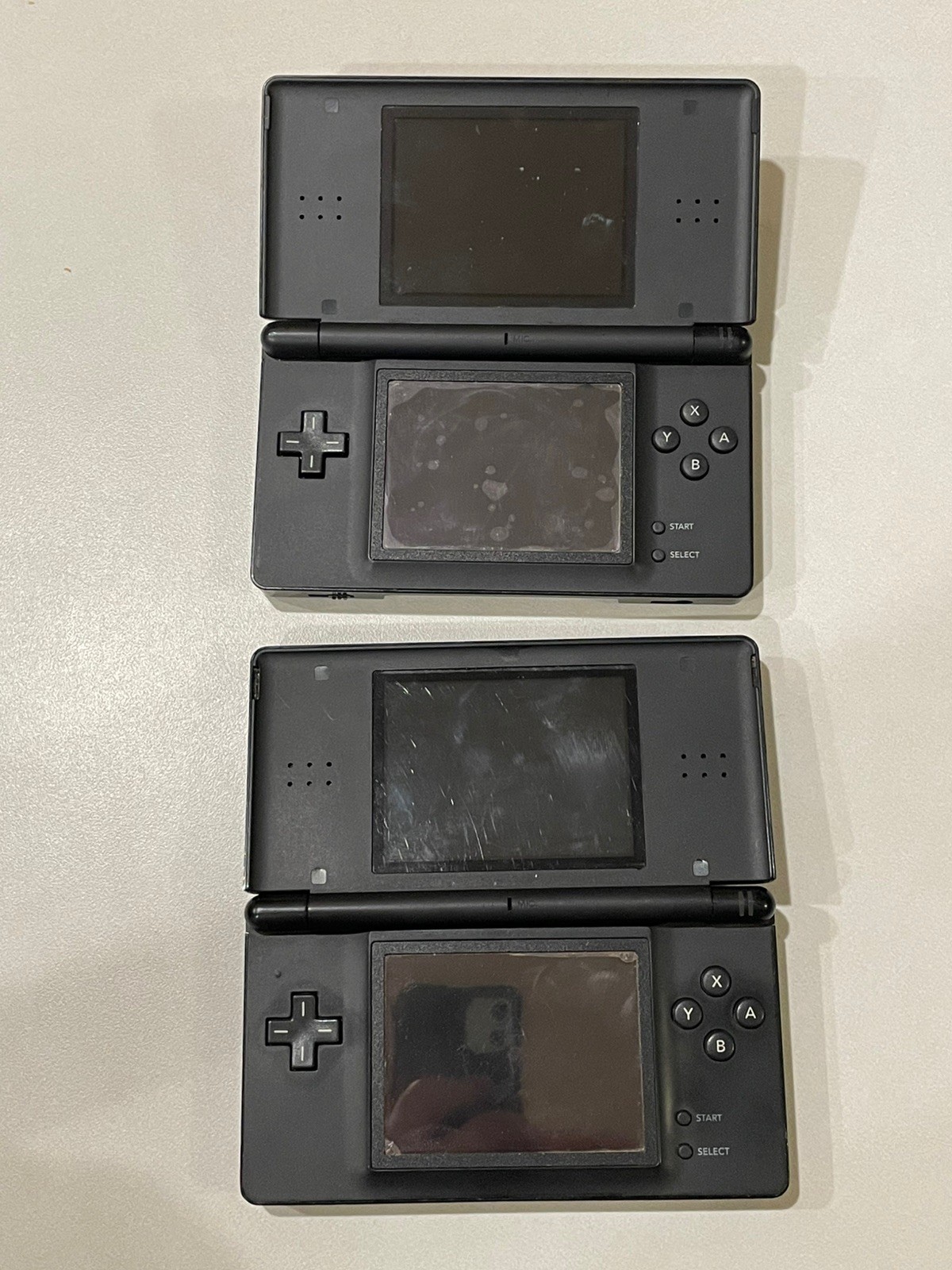 2 Nintendo DS Lite -Black. For Parts/Not Working. No Charger.