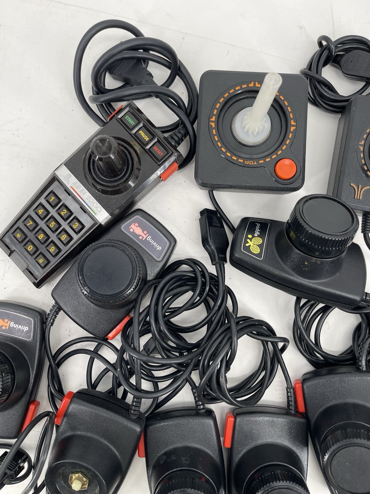 Huge Bulk Lot 15 Atari 2600 Controllers Joysticks Paddles, Adapter & Games