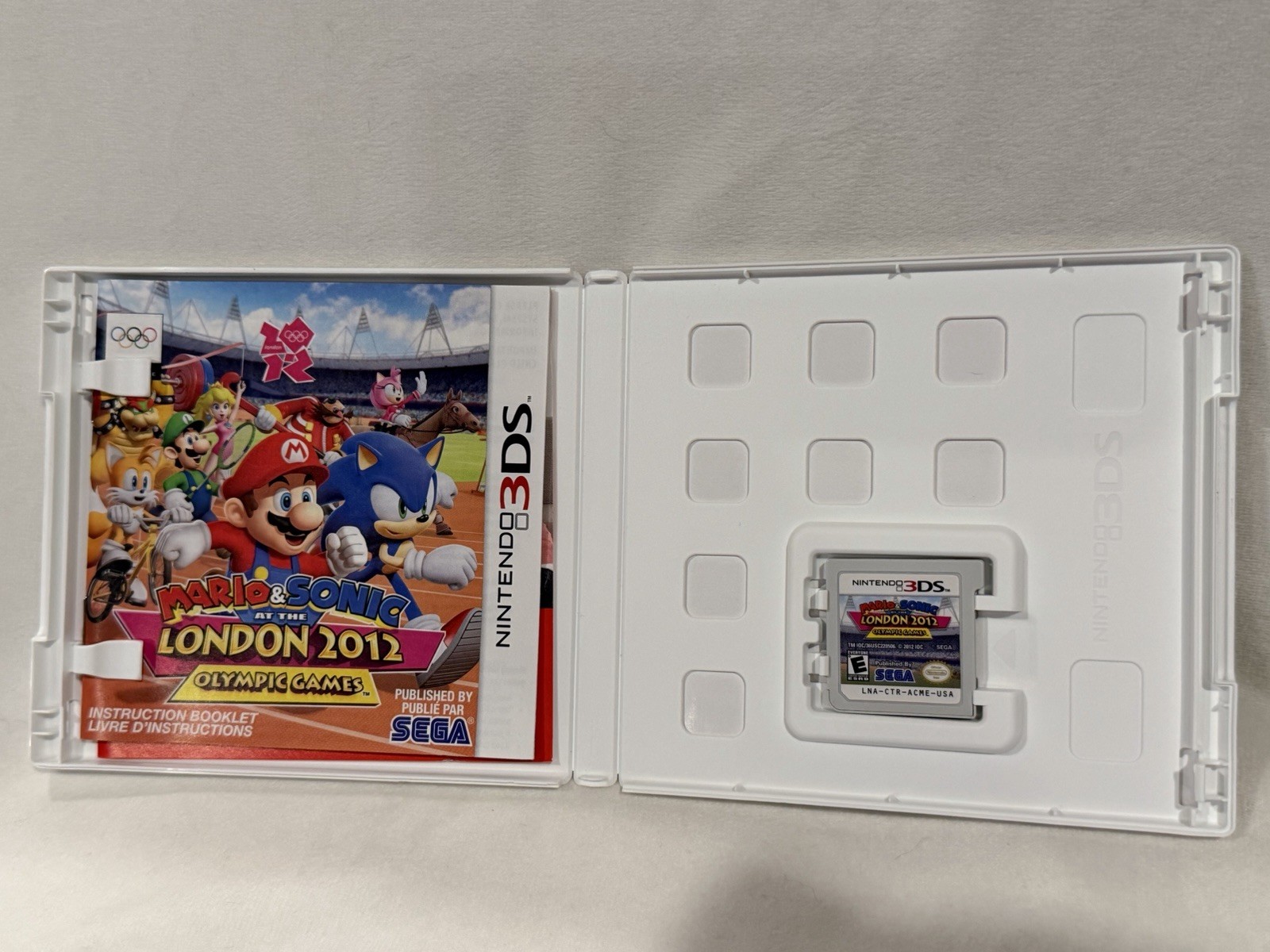 Nintendo 3DS Flame Red CTR-001 USA with 4 Games Mario & Sonic , Raving Rabbids