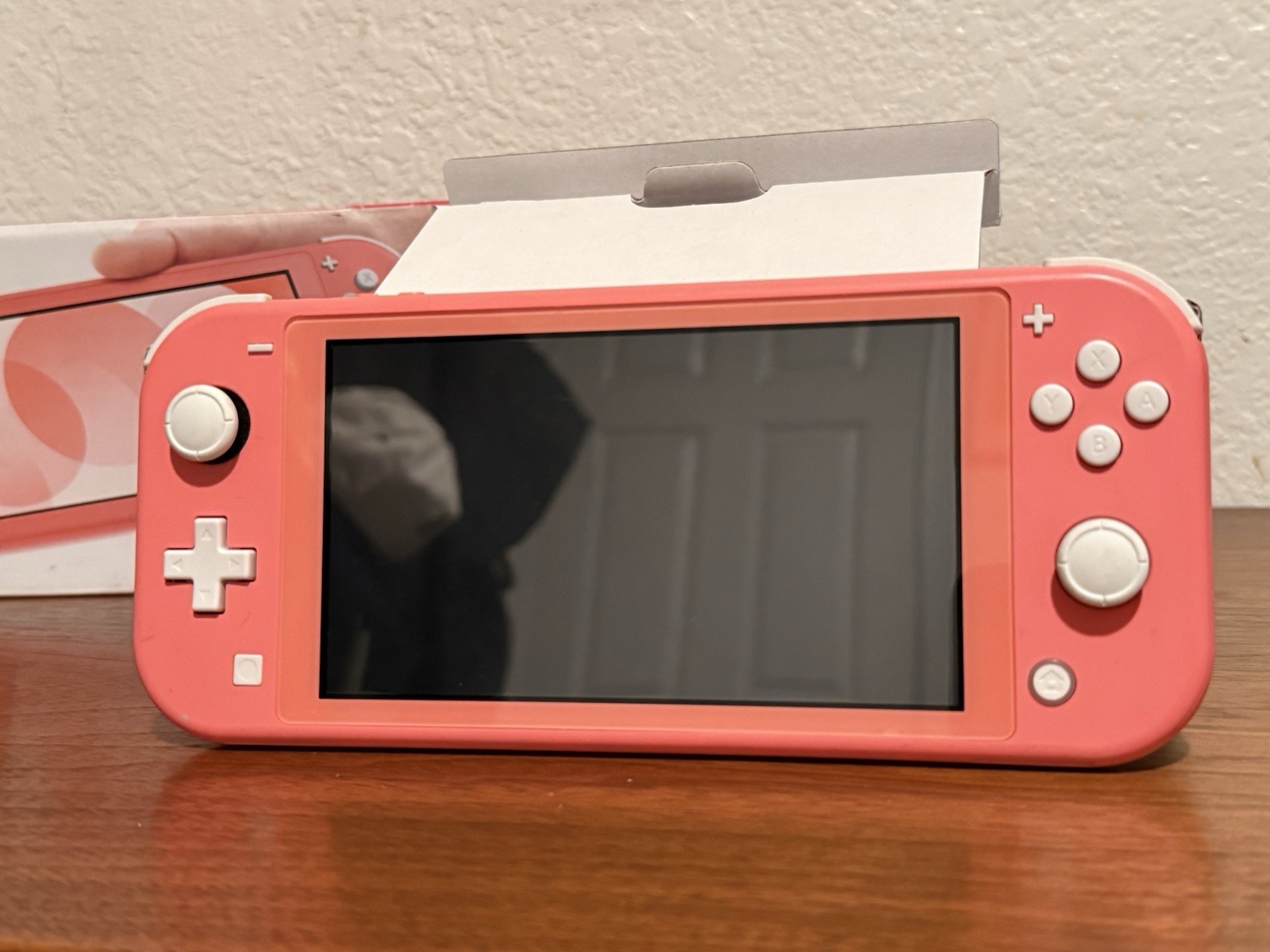 Nintendo Switch Lite 32 GB Gaming Console – Coral + Animal Crossing New Horizons