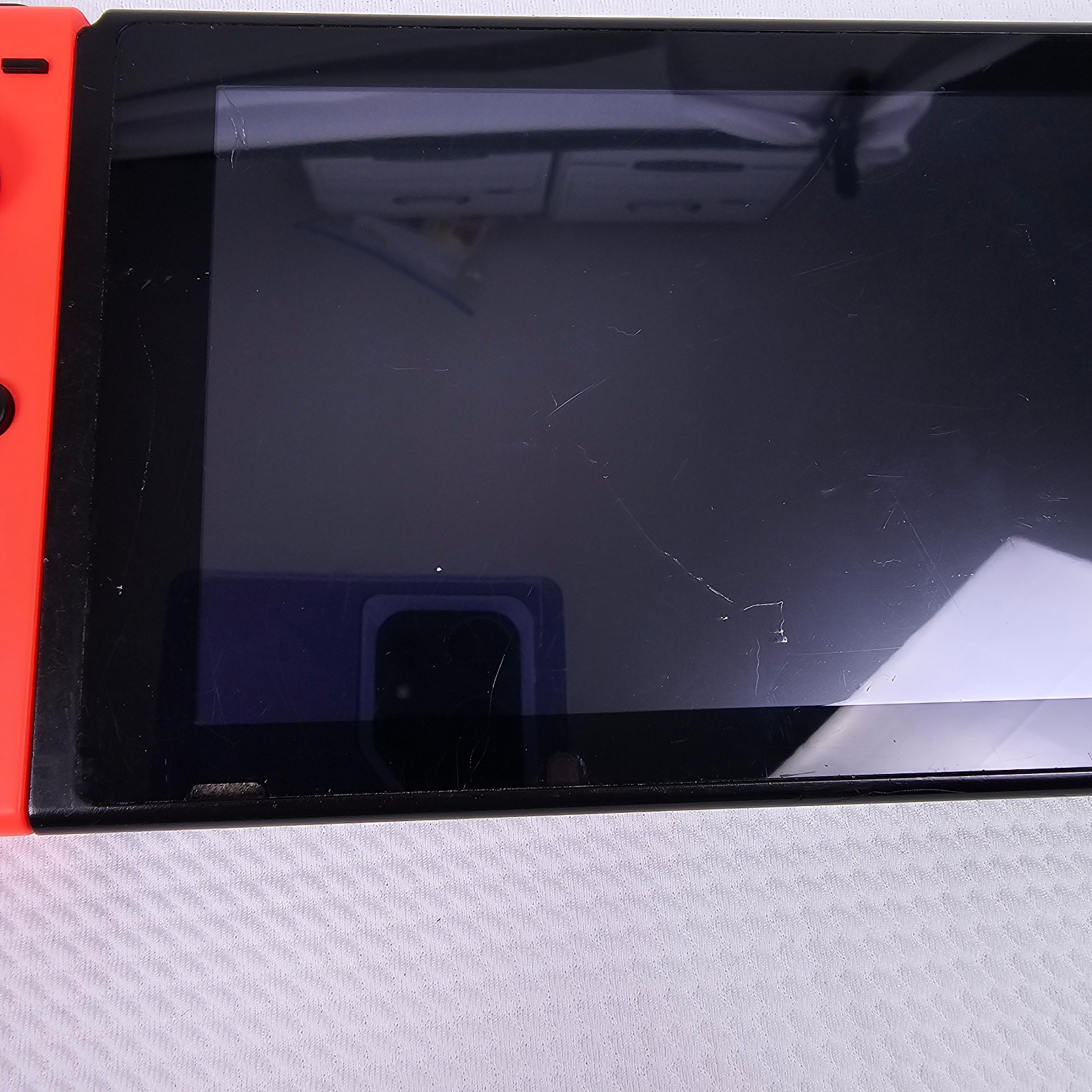 Nintendo Switch Console w/ Dock & Neon Red/Blue Joy-Con, 32GB Wi-Fi 1080p READ