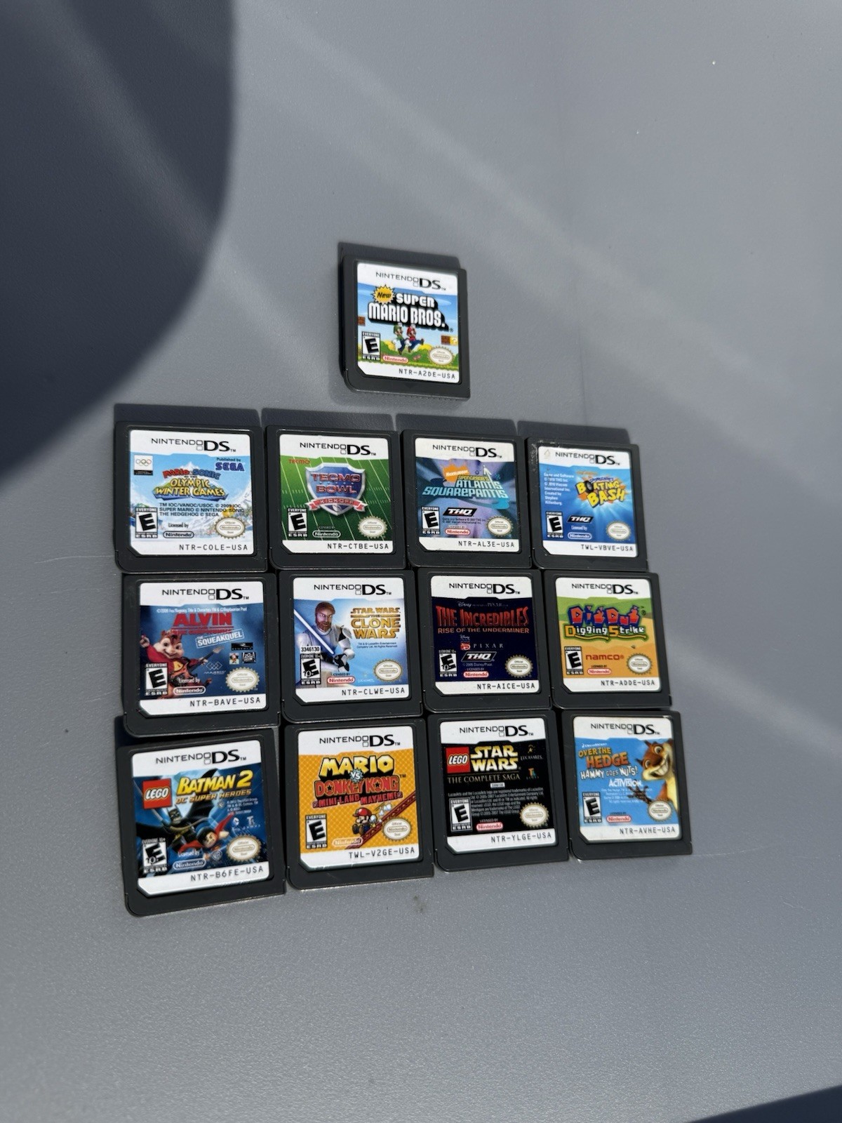 Nintendo DSi Lite Blue Console + Game Cartridge Lot (Mario, Star Wars, Batman)