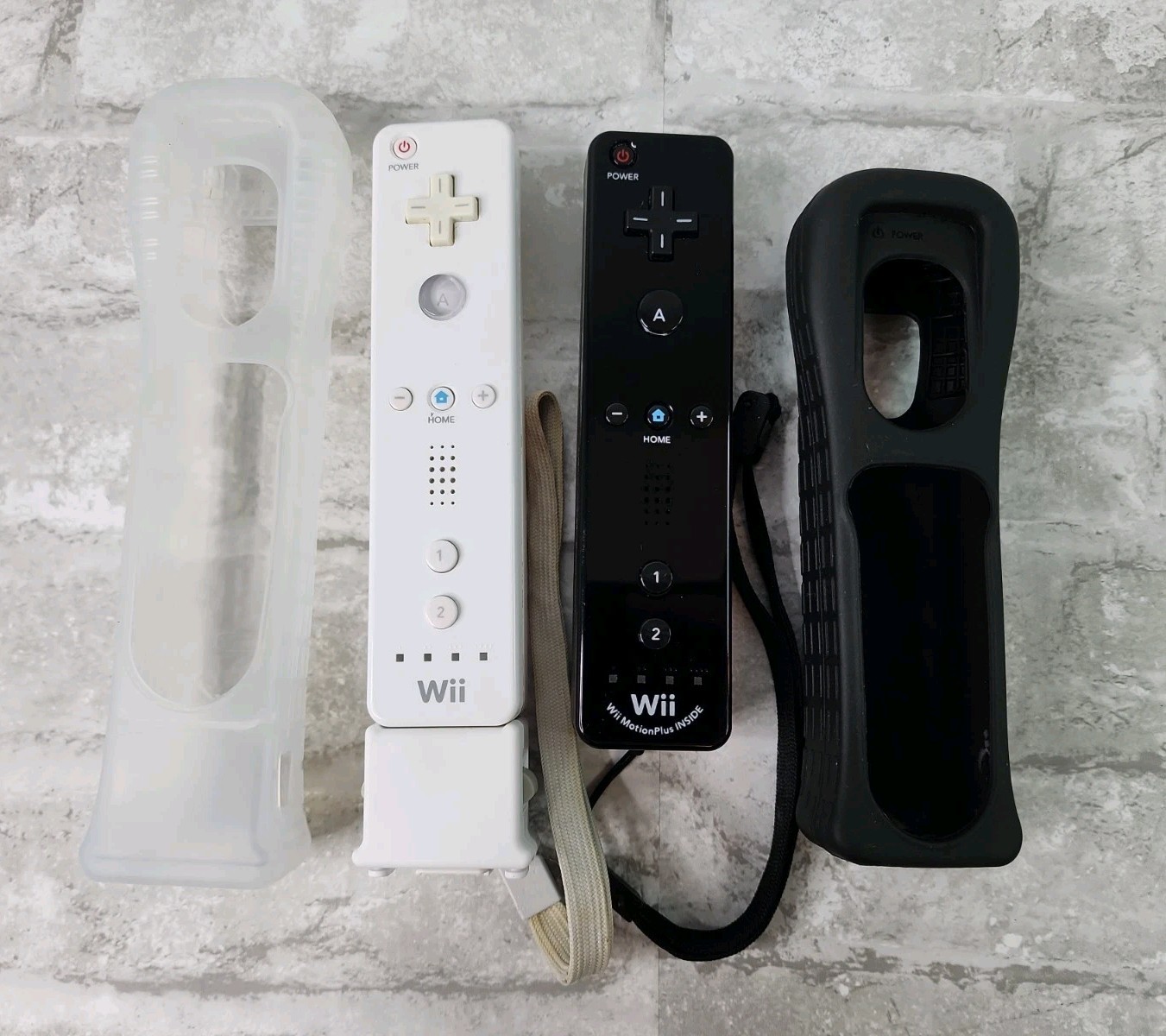 Lot Of 2 Nintendo Wii OEM Wiimotes Remotes Motion Plus Black & White w/ Covers