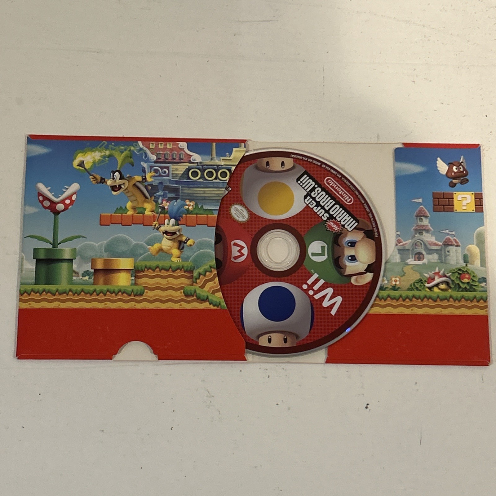 New Super Mario Bros. Wii (Game + Cardboard Sleeve)