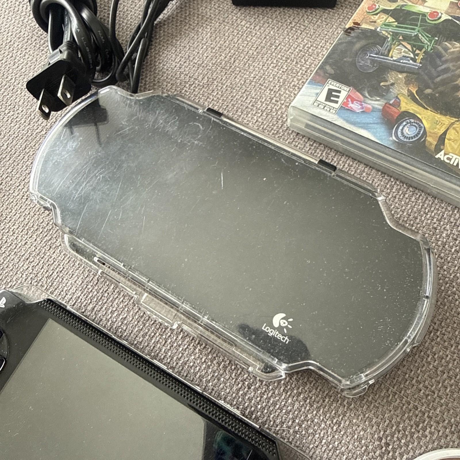Sony PSP-1001 Black Console With Charger, 1GB Card , 11 Movies 2 Games & Case