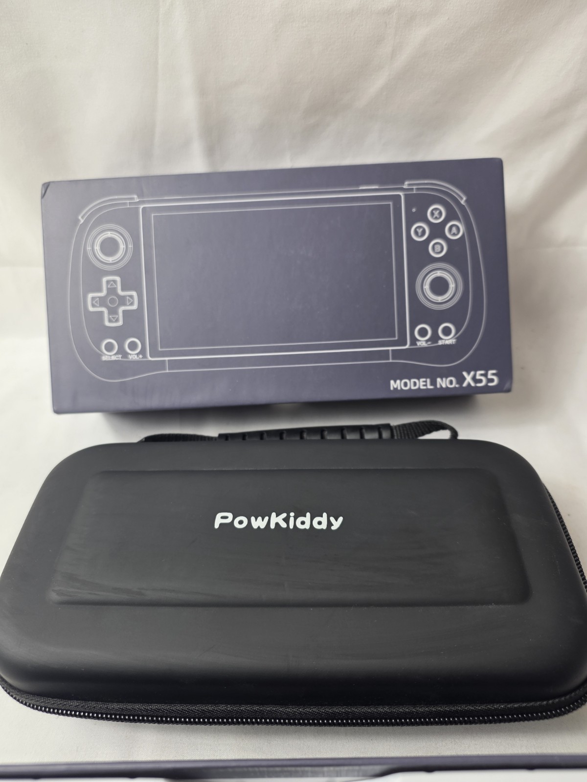 New Powkiddy X55 Portable gaming handheld 5.5″ IPS Screen With Games