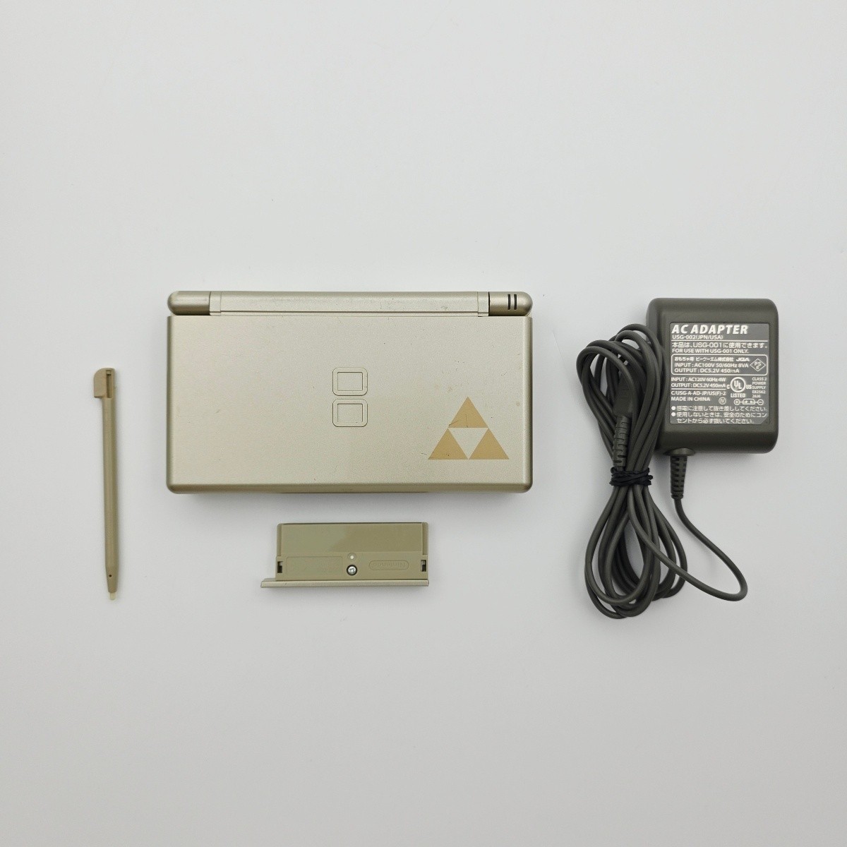 Nintendo DS Lite Zelda Triforce Gold Handheld System with Charger Stylus