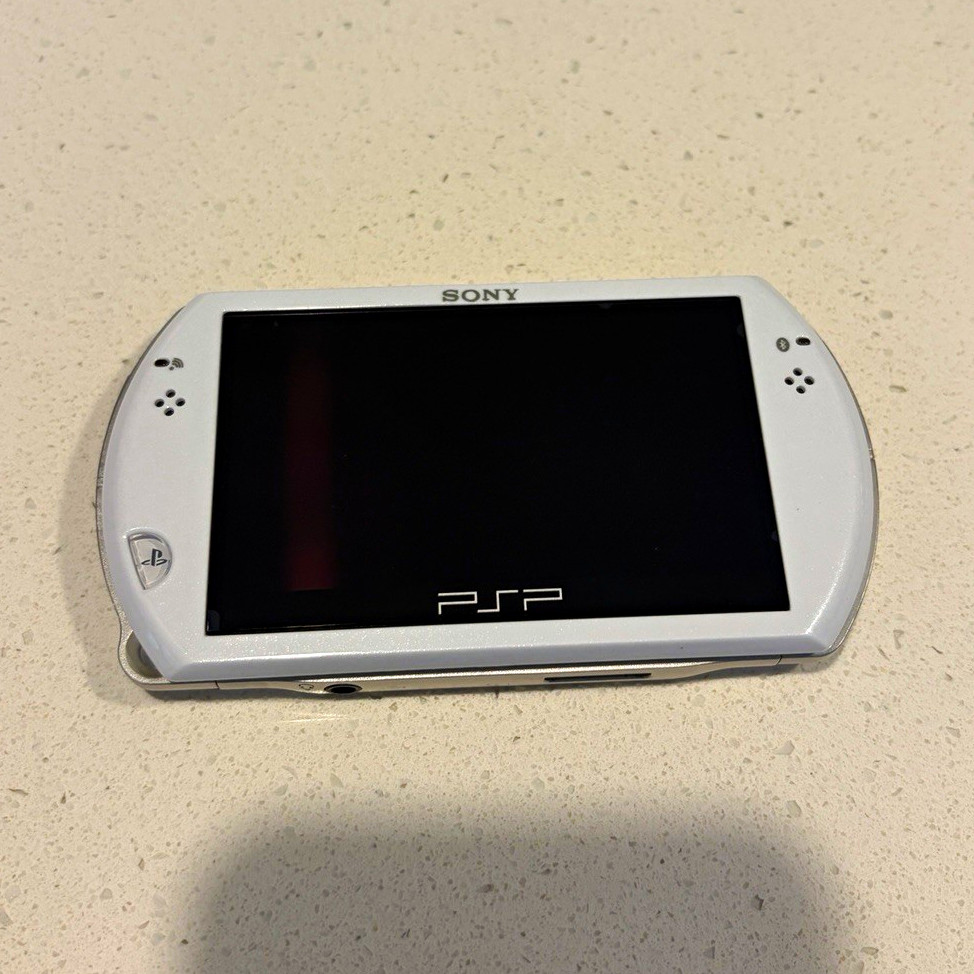 Sony PSP Go White/Silver 16GB Wi-Fi Region Free Handheld w/ AC Adapter
