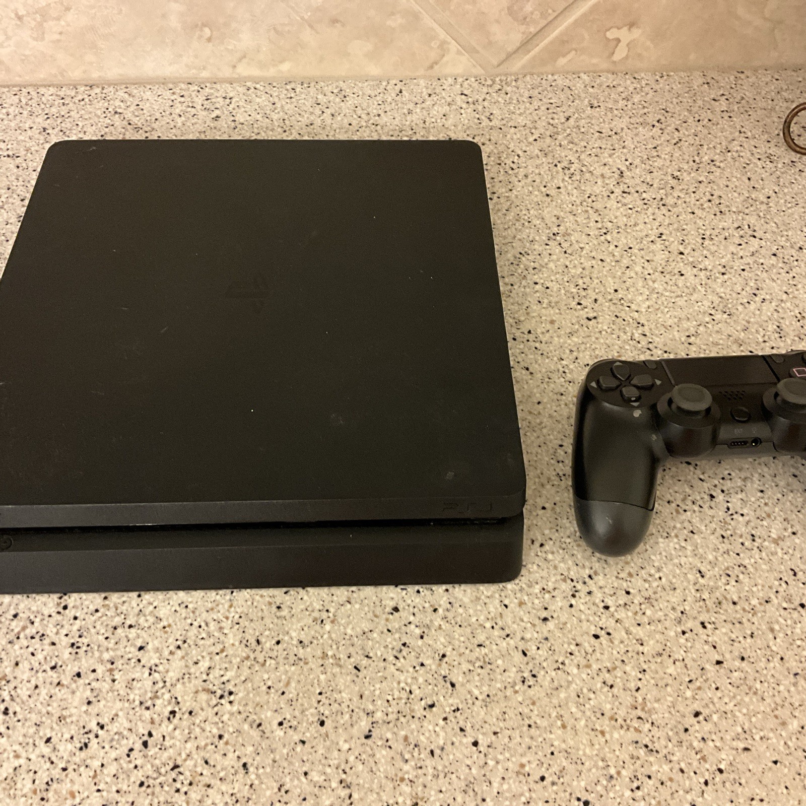 Sony PlayStation 4 Slim Black Home Console w/ Dualshock (Version 13.50)