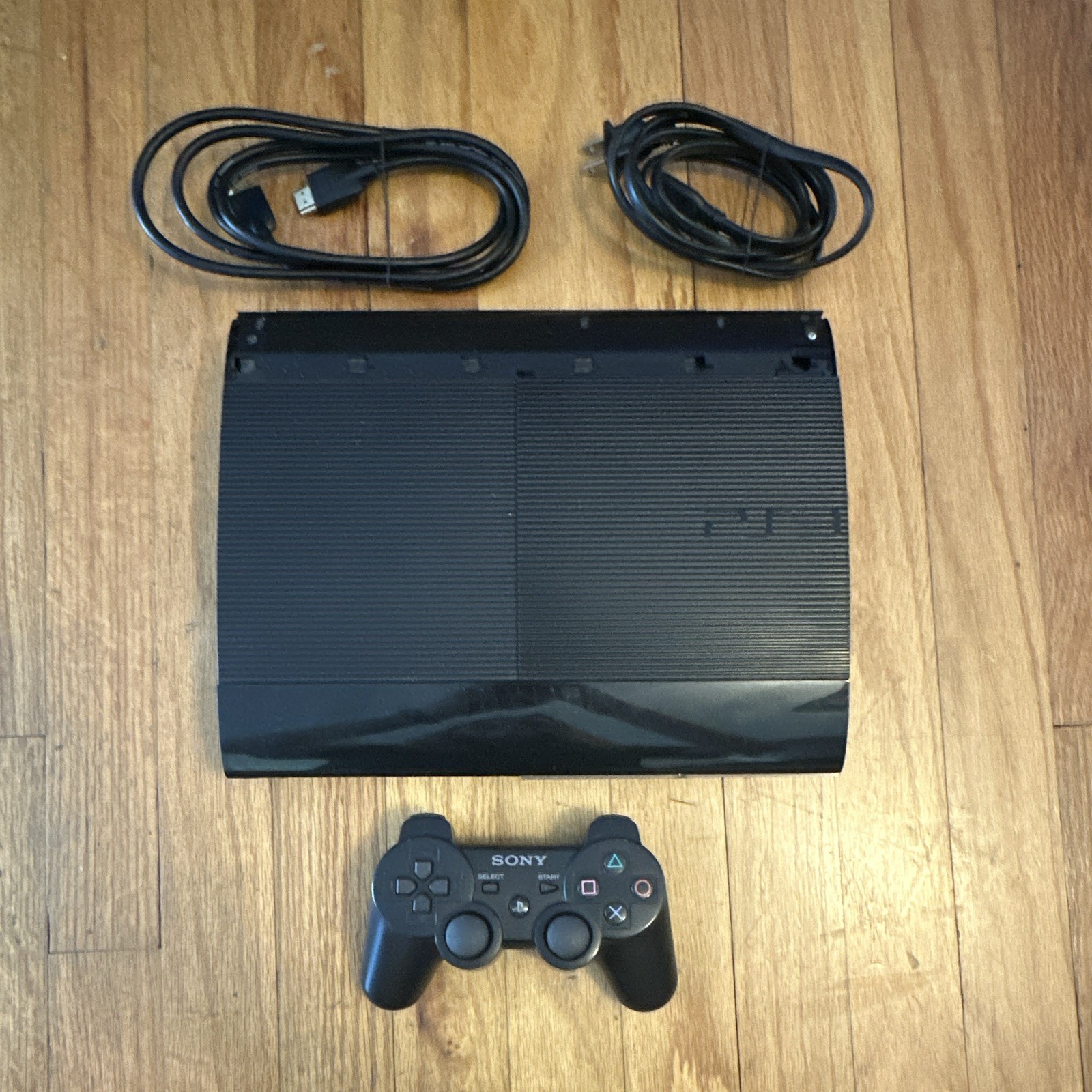 Sony PlayStation 3 Super Slim 500GB Black w DualShock 3, Wi-Fi, NTSC-U/C