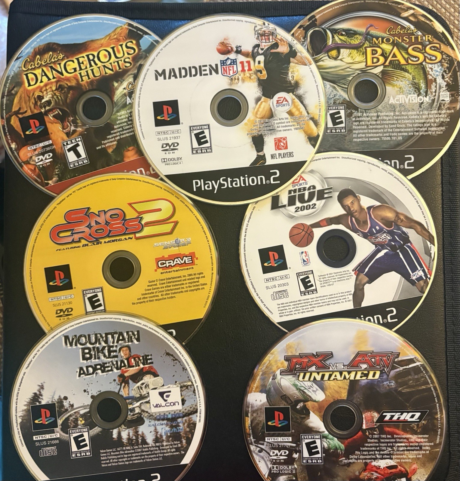 Ps2 Sports Titles (Cabela’s, Madden, ATV, NBA Live, Sno Cross 2, Mountain Bike)