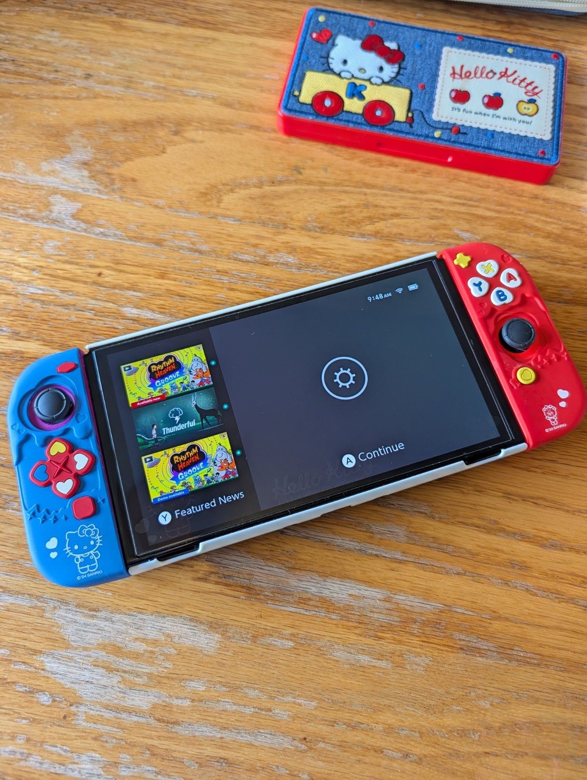 OLED Nintendo Switch + Hello Kitty Accessories