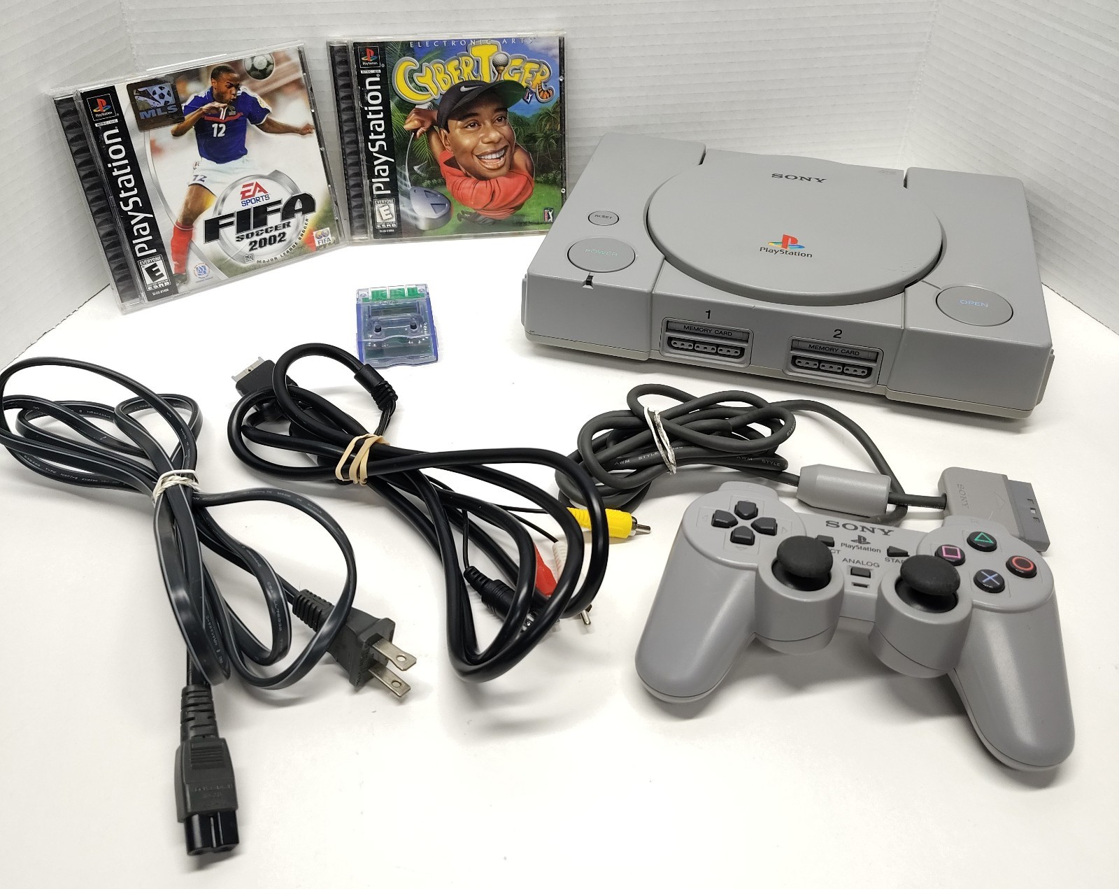 Sony PlayStation 1 SCPH-7501 W/ 2 Games 1 Controller Cables Mega Mem Card Tested
