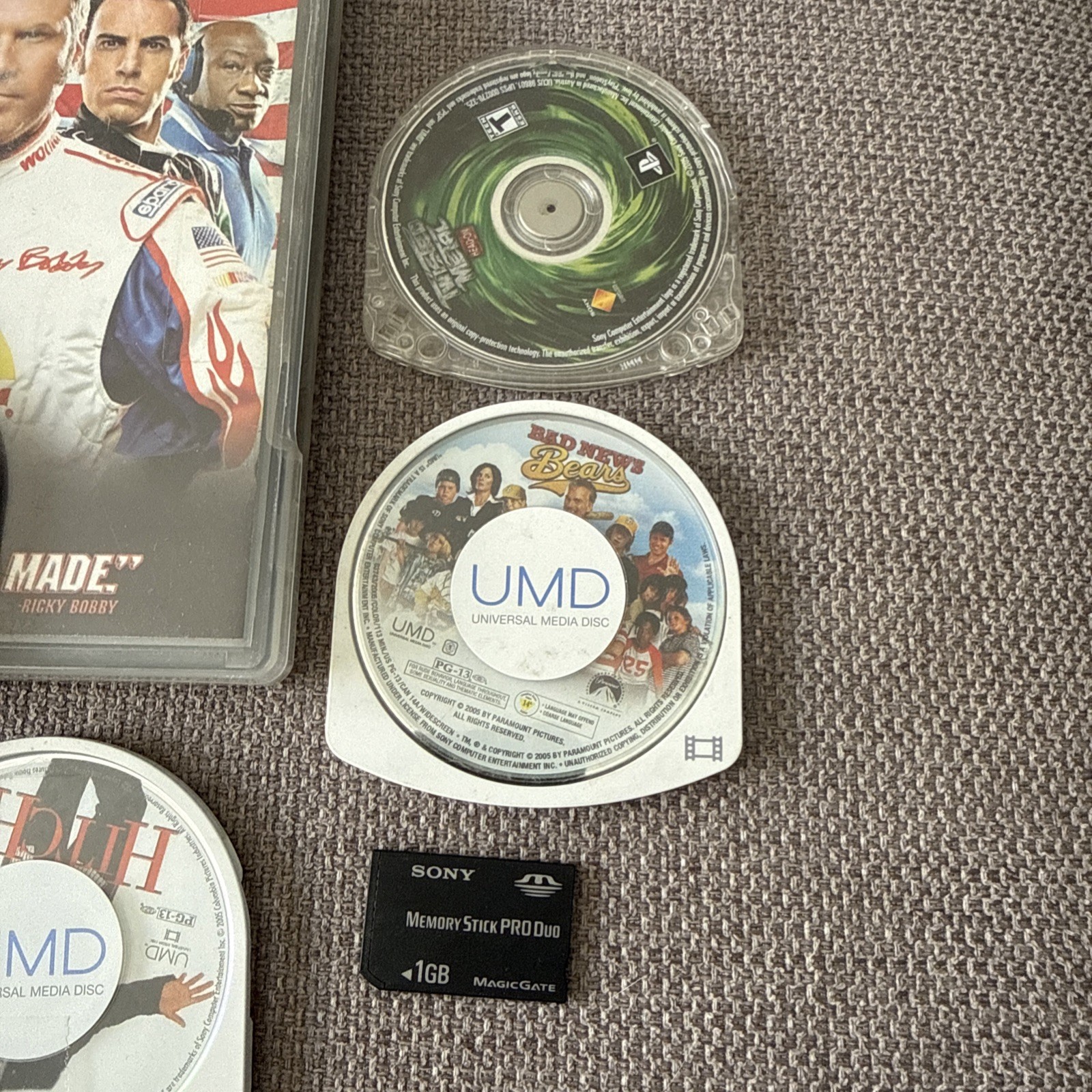 Sony PSP-1001 Black Console With Charger, 1GB Card , 11 Movies 2 Games & Case