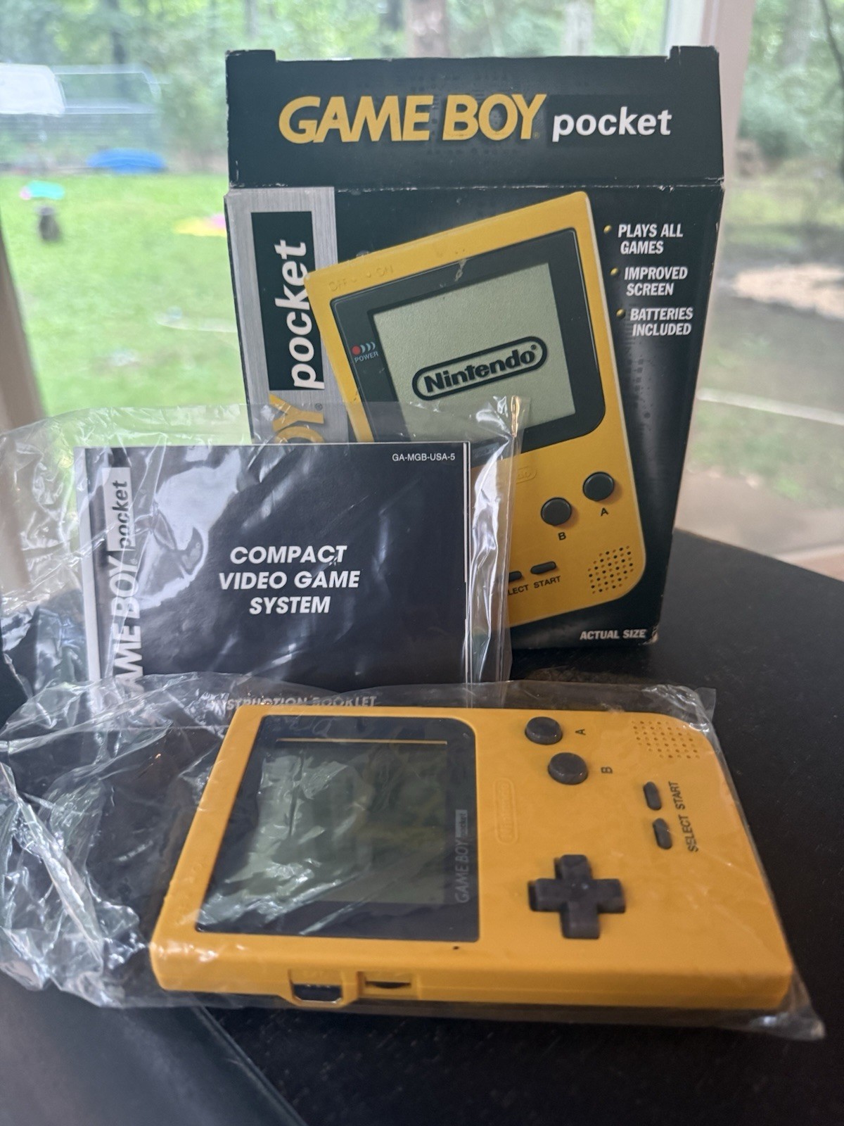Nintendo Game Boy Pocket Yellow Handheld- 1997 (includes instructions) Mint
