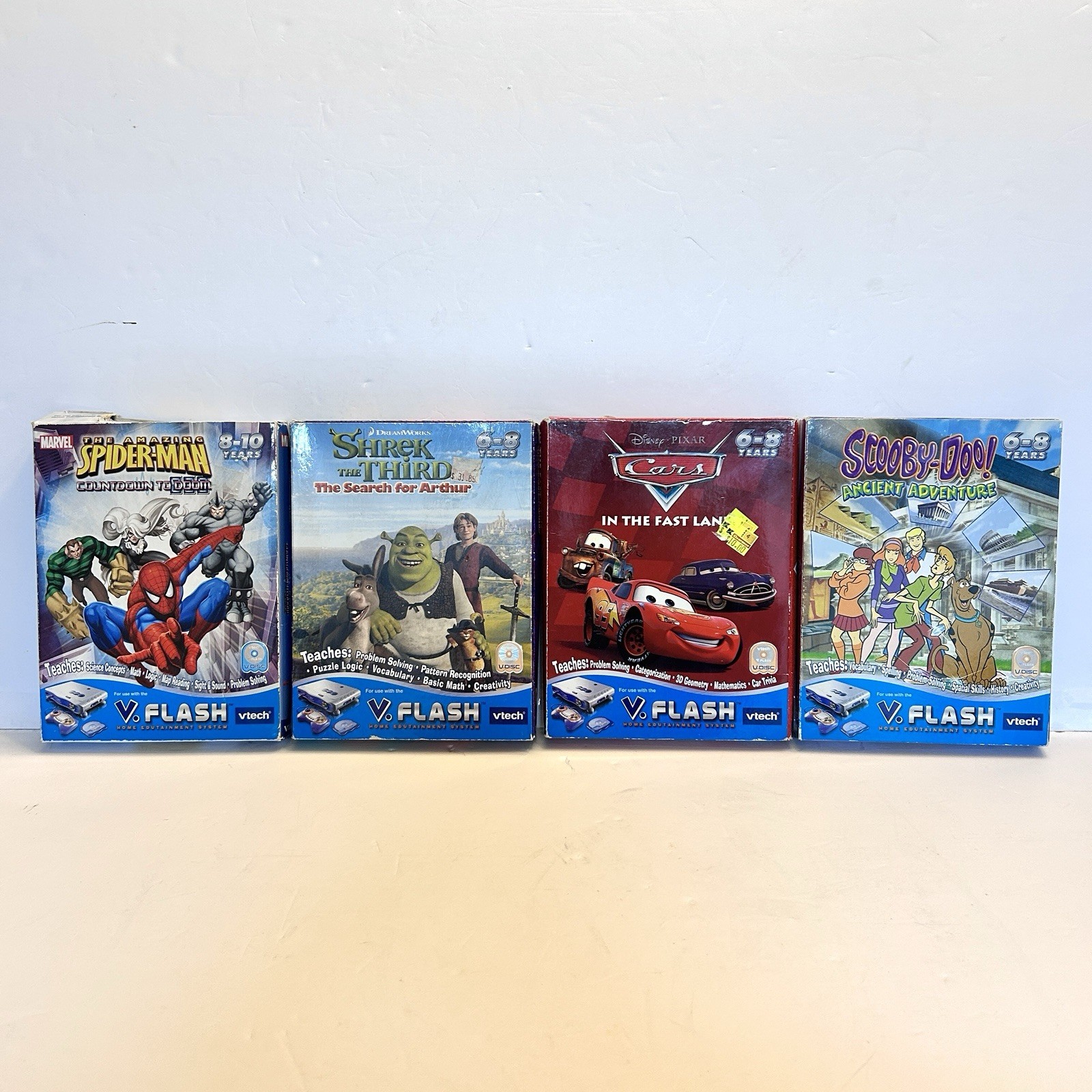 Vtech V.Flash Video Game Lot (4) Scooby-Doo, Cars, Spider-Man, Shrek the Third