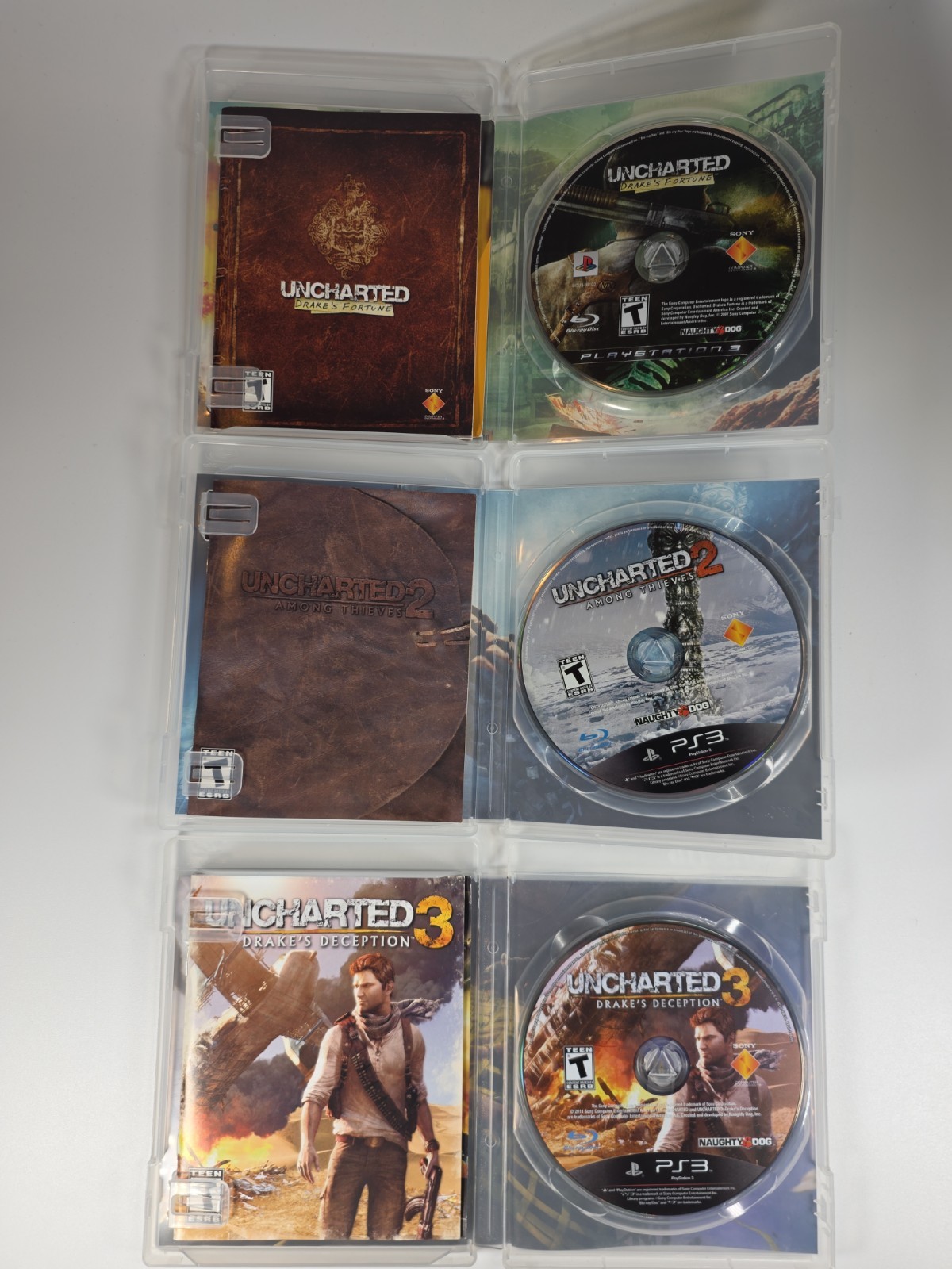 Sony PlayStation 3 -PS3 – Black Label Uncharted Trilogy – 1, 2, And 3 Lot CIB
