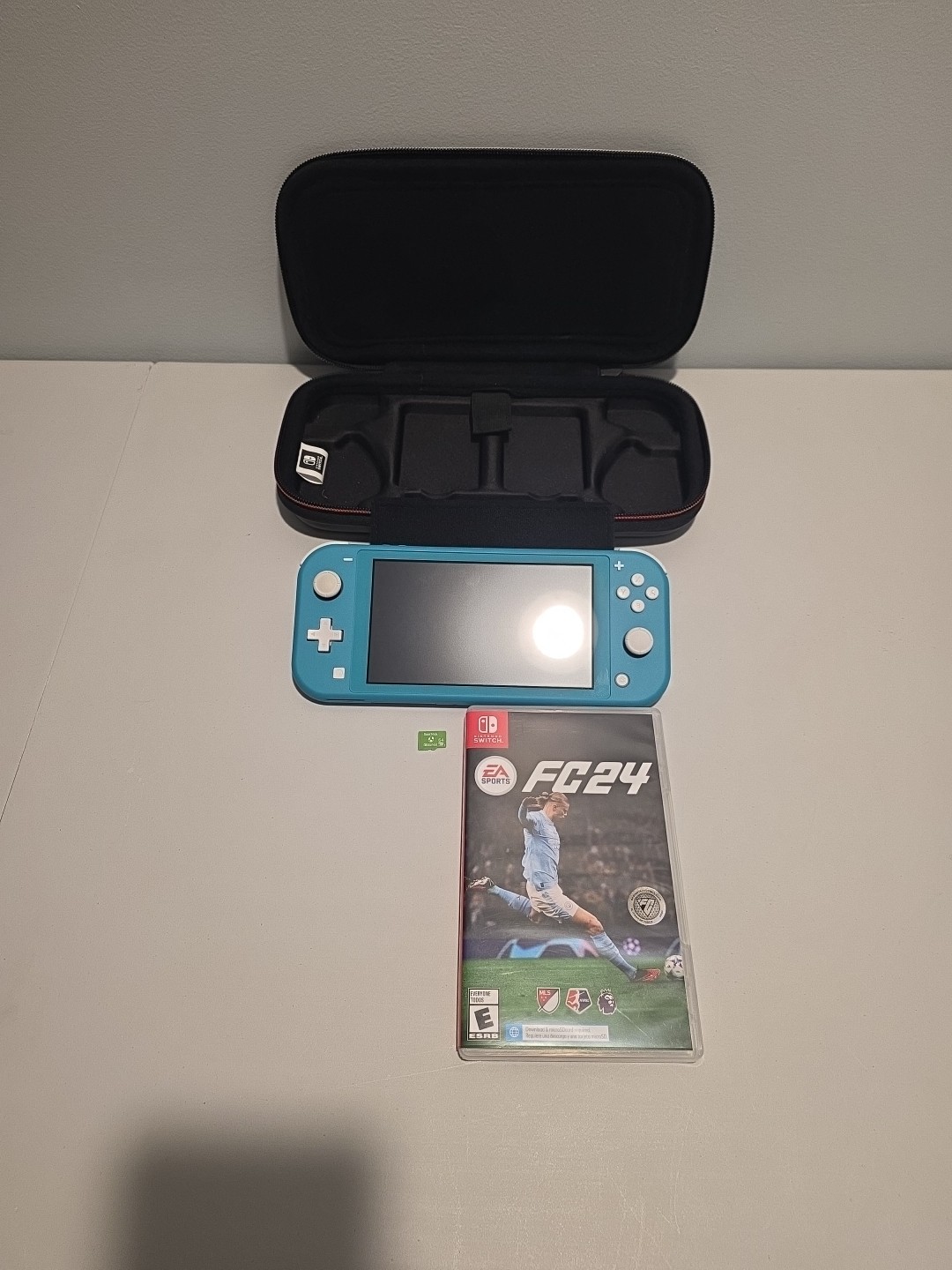 Nintendo Switch Lite Turquoise & Case And Fc24 Game