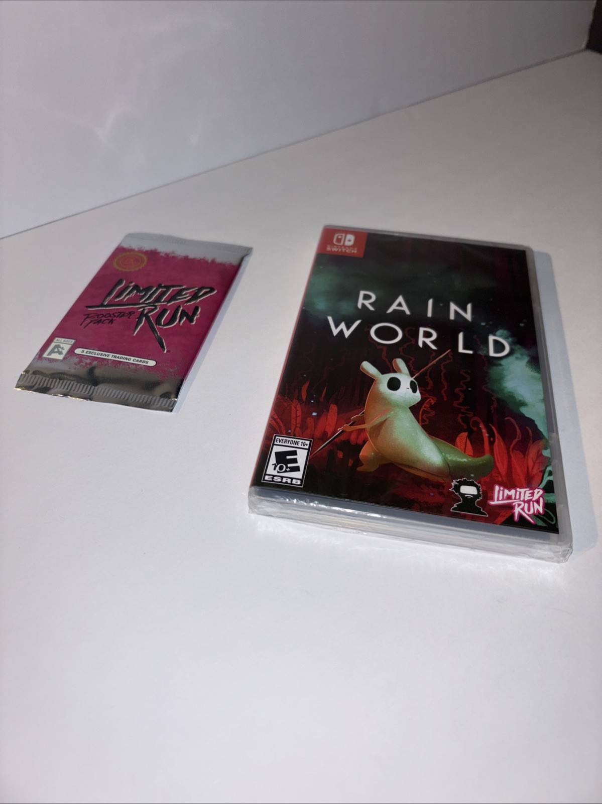 NEW RAIN WORLD U.S. ESRB & LIMITED RUN GAMES TRADING CARD BOOSTER PACK SWITCH!