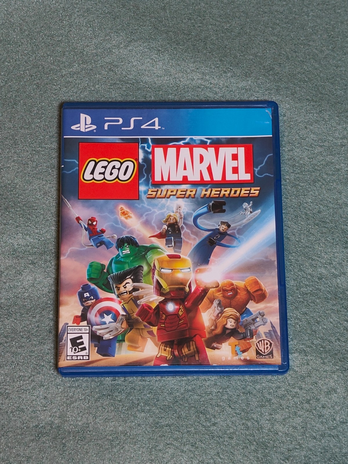 Warner Bros LEGO Marvel Super Heroes PS4 With Case Used Tested Minor Box Damage