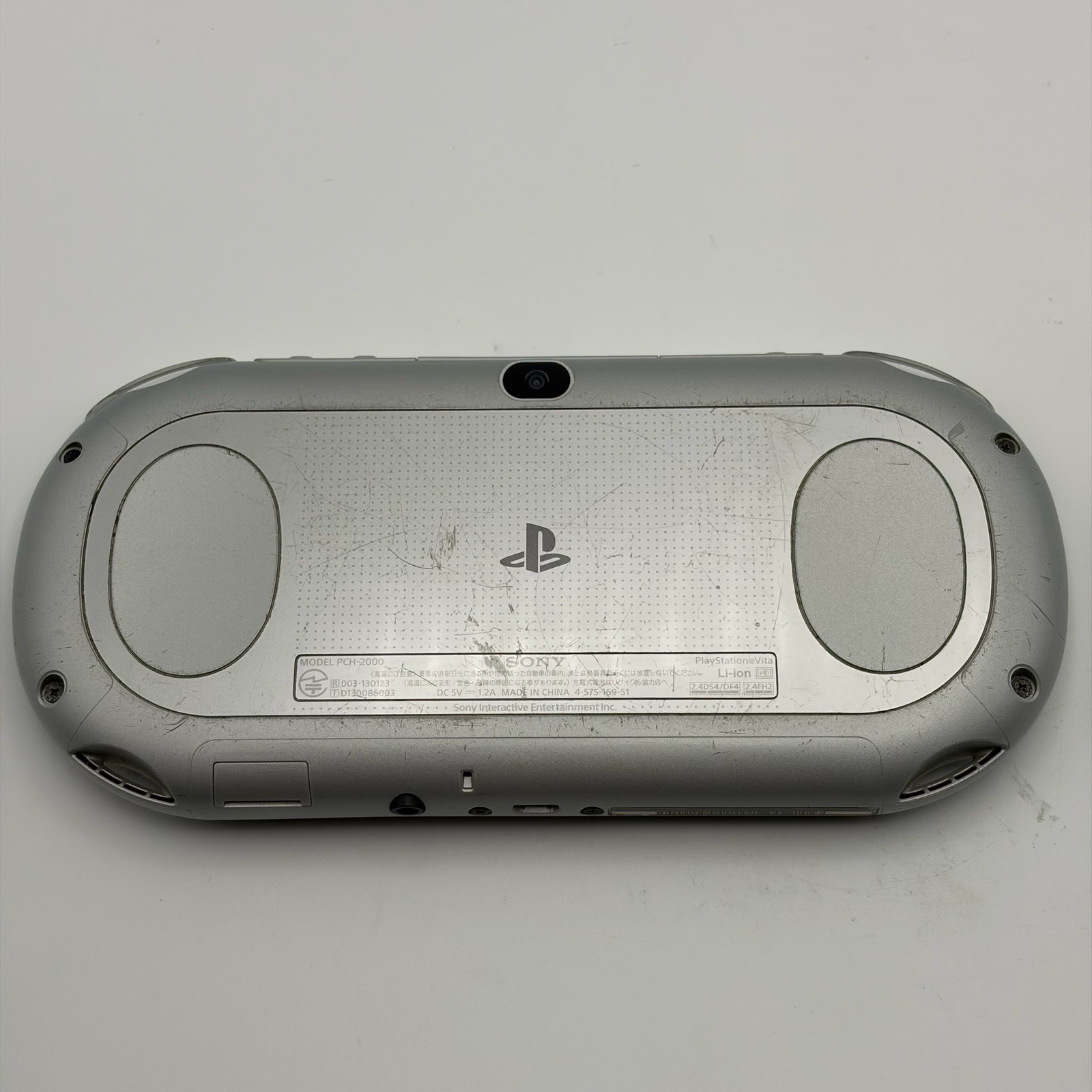 SONY PS Vita PCH-2000 Console Silver Very Good Fast Shipping No joystick drift.