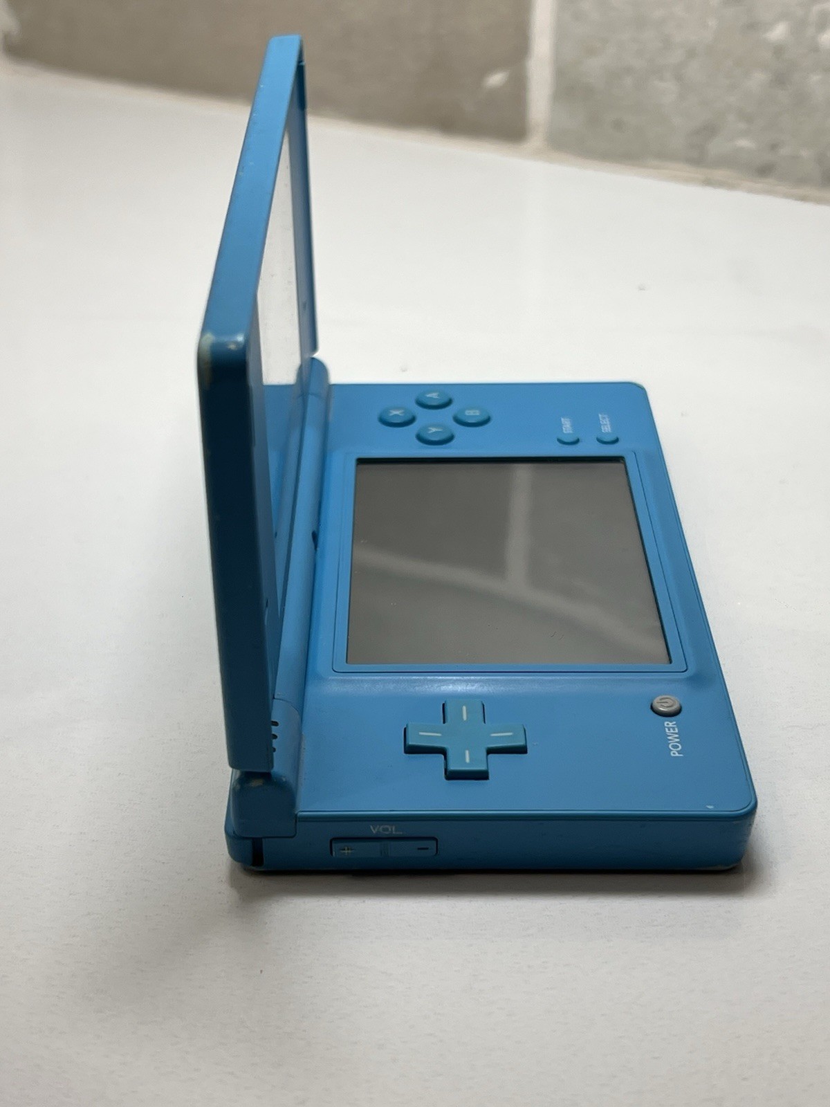 Nintendo DSi Light Blue Handheld Console Game System + Charger + Stylus Tested