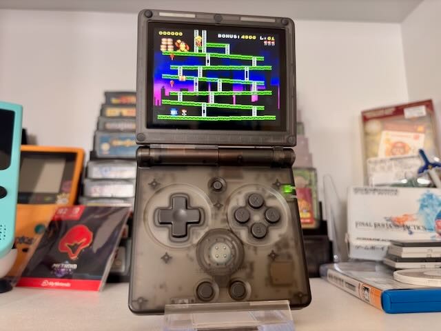 Anbernic RG35XX SP Retro Clamshell Handheld Game Console Black Trasnparent