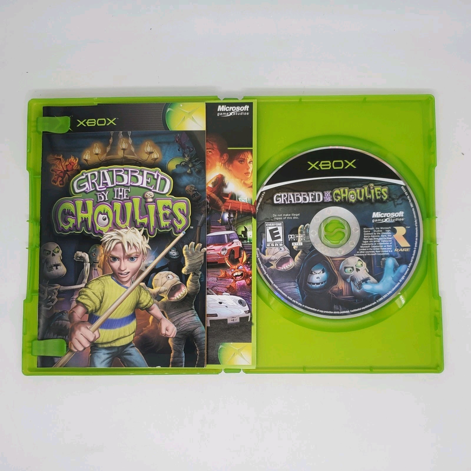Grabbed by the Ghoulies OG Xbox CIB w Insert Tested And Working Good Condition.