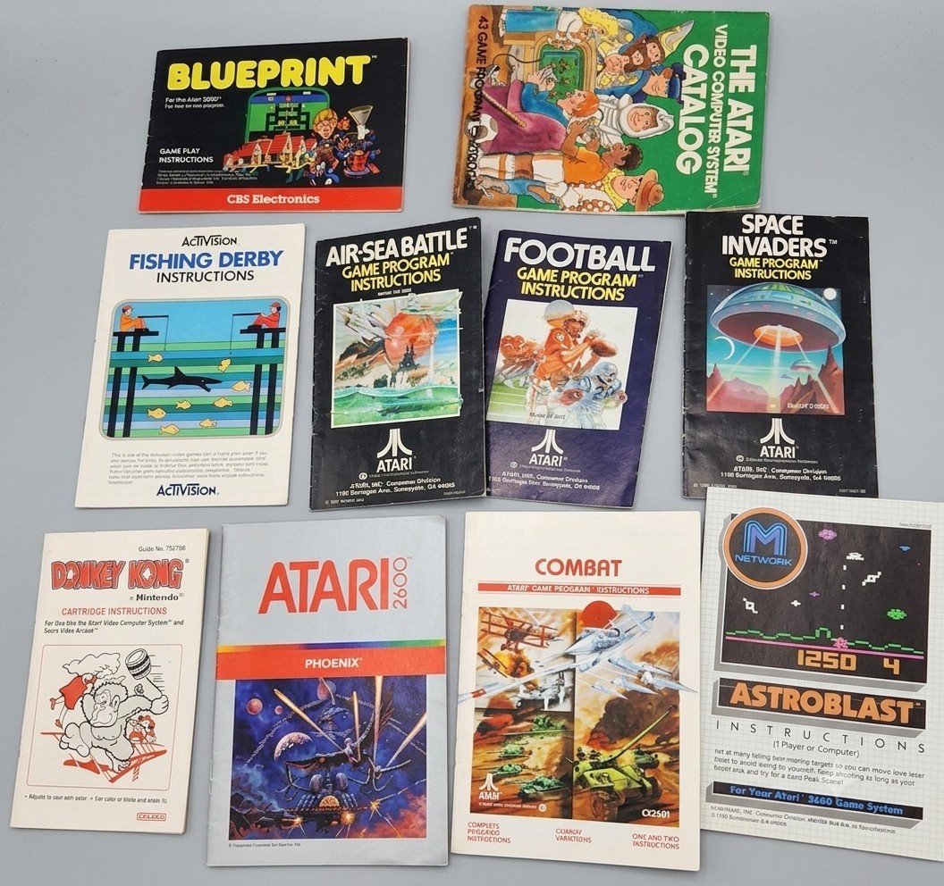 Atari 2600 LOT of 10 Manuals Blueprint Phoenix Astroblast Combat Fishing Derby