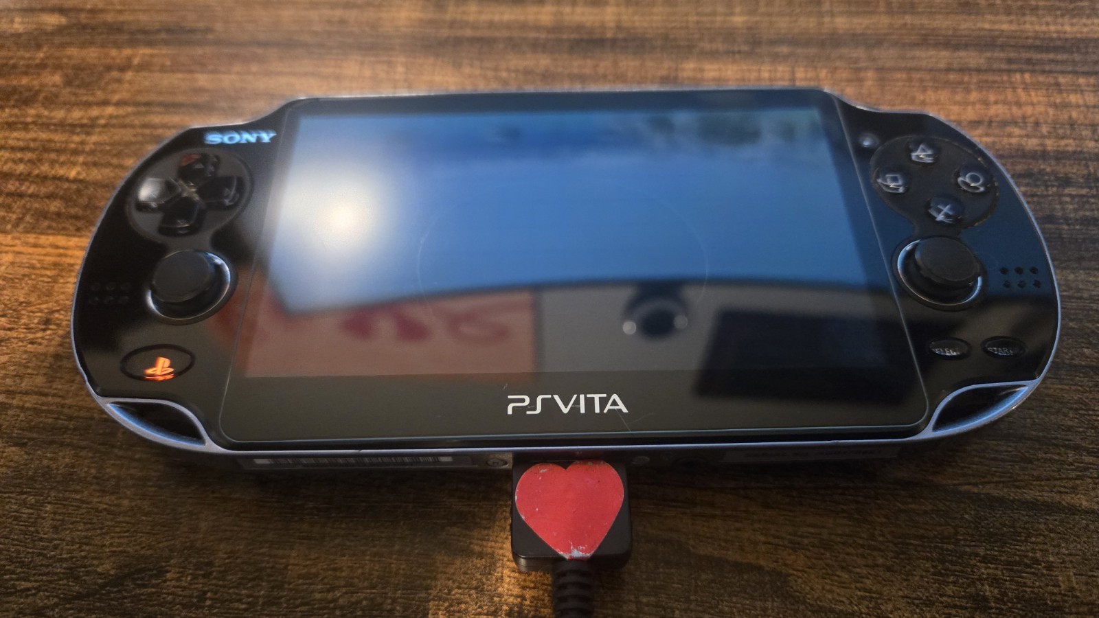 Sony PlayStation Vita PCH-1001 OLED with Homebrew