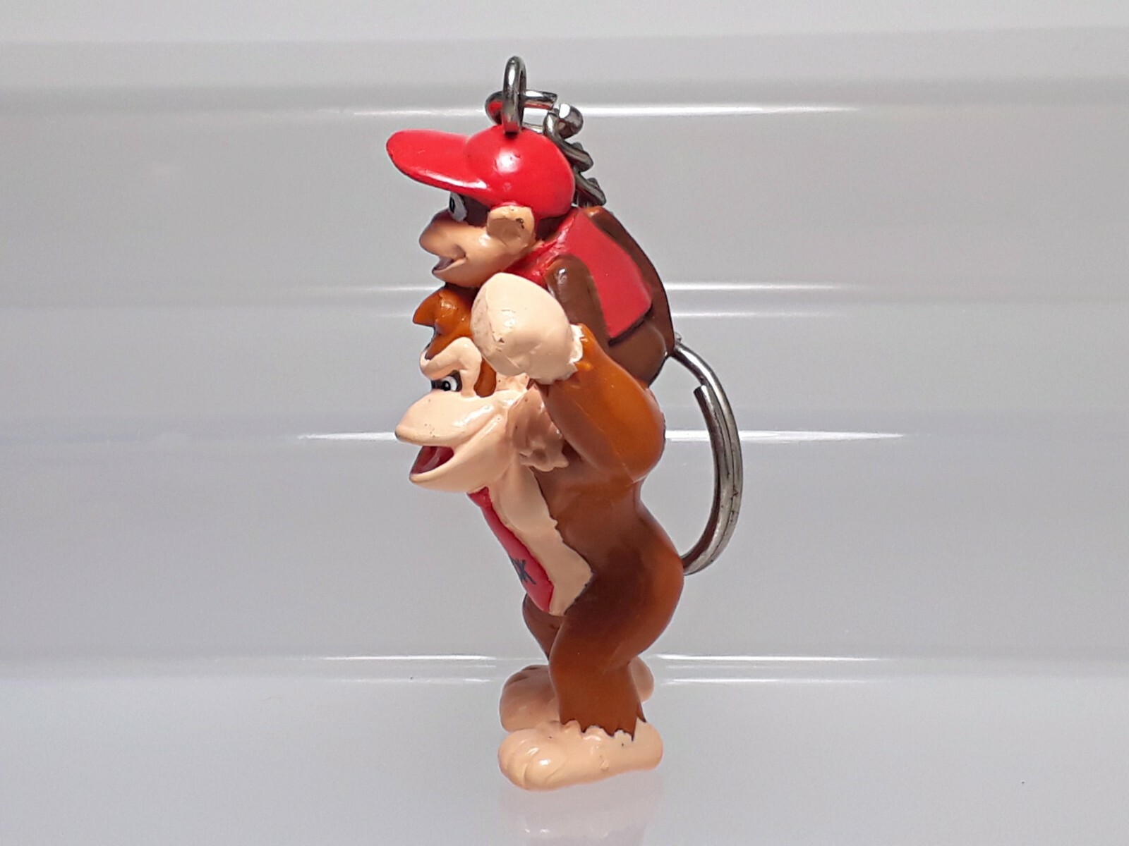 Diddy riding Donkey Kong Country Rumble in the Jungle Figure Keychain 1995 2.4in