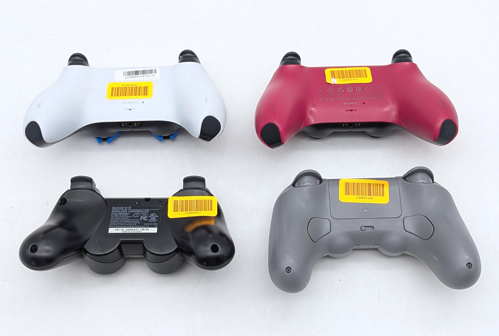 Assorted Wireless PlayStation Video Game Controllers & Charging Station Lot of 9