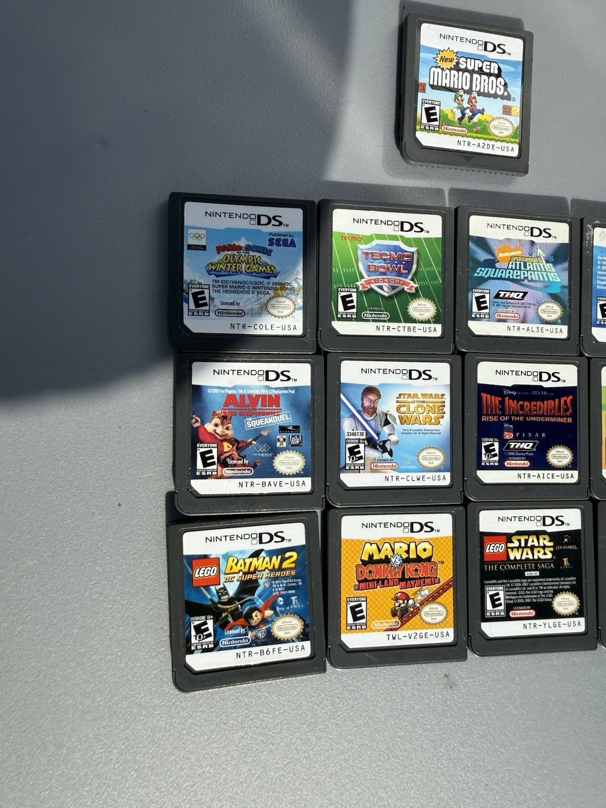 Nintendo DSi Lite Blue Console + Game Cartridge Lot (Mario, Star Wars, Batman)