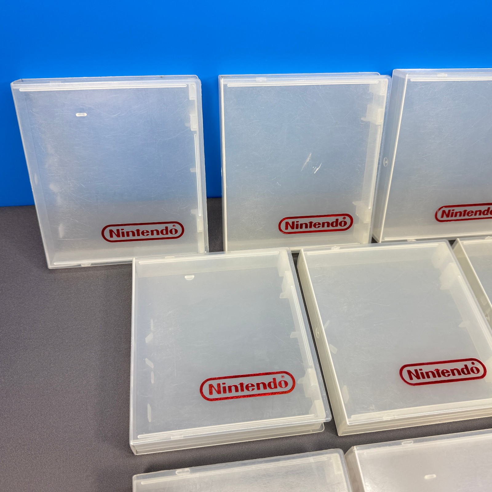 LOT OF 10 NINTENDO NES GAME HARD PLASTIC CLAMSHELL CASE CASES CLEAR RED LOGO OEM