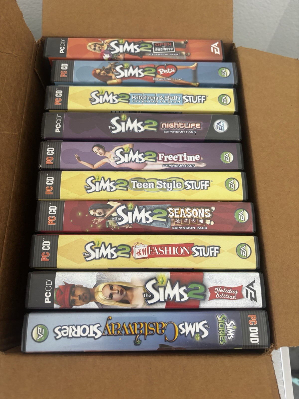 The Sims Collection (1-4)— 18 games w/cases, 3 official Prima guides (PC) + MORE