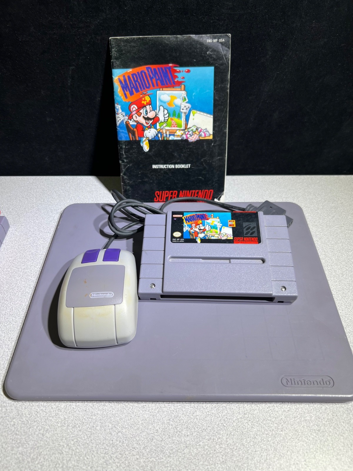 Super NES SNS-001 Console, Controllers, Paint Pad w/Mouse, Game Genie & 7 Games