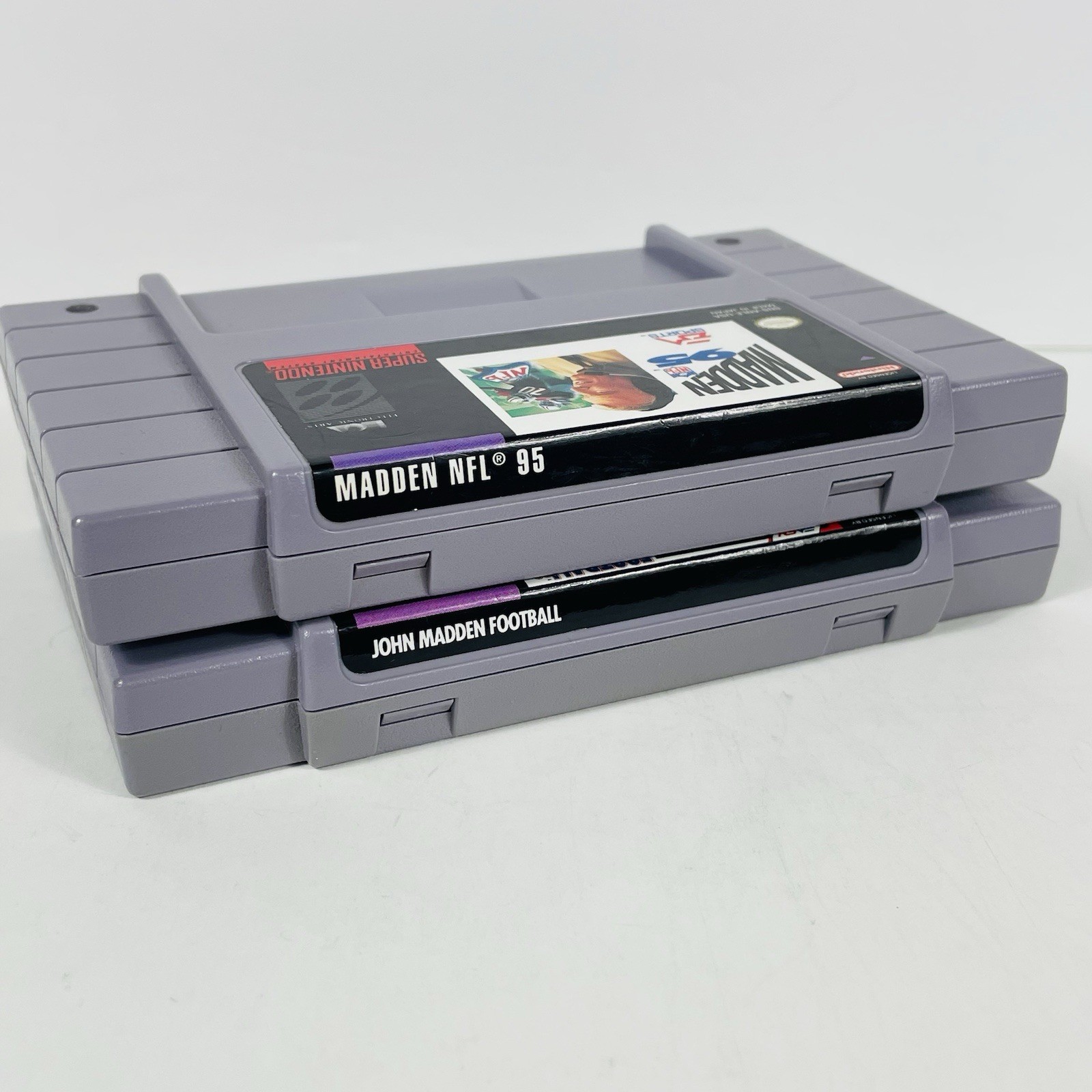 Madden NFL 95 and John Madden Football SNES Cartridges Authentic and works.