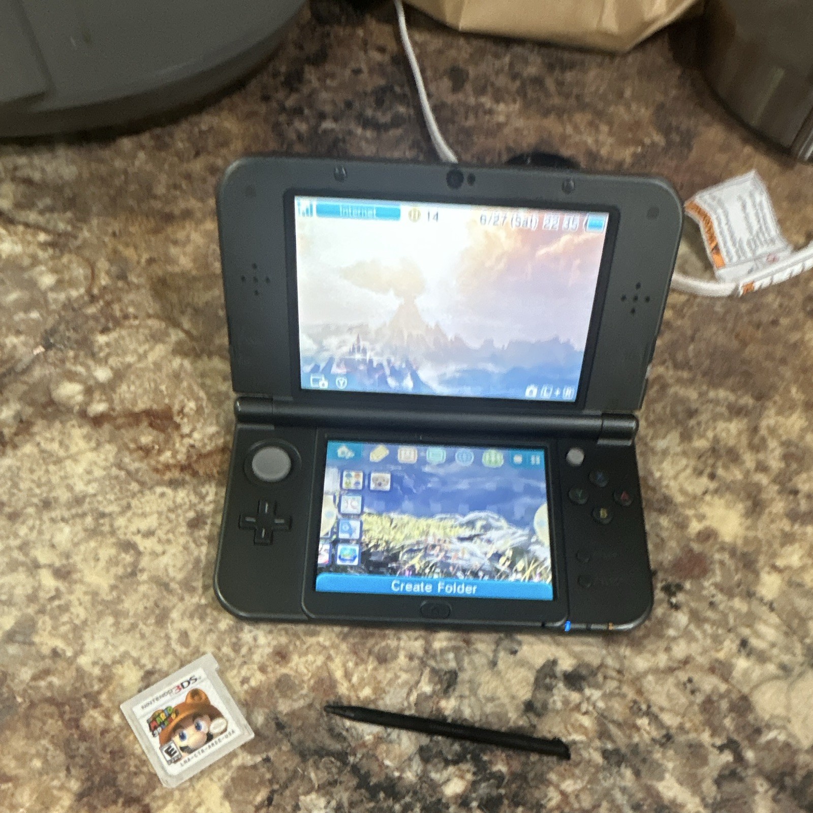 Nintendo New 3DS XL Handheld System 128 GBsd card charger and stylus included